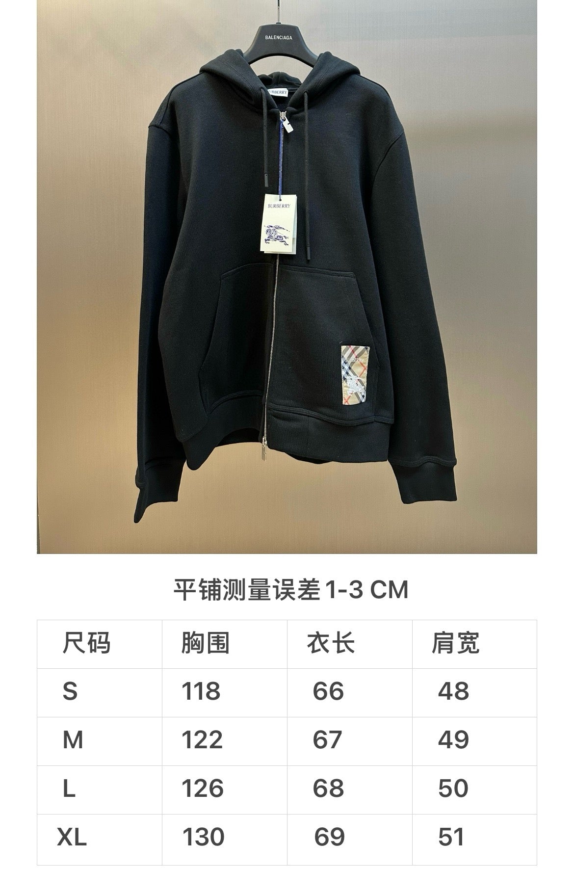 Schwarze und graue Jacke