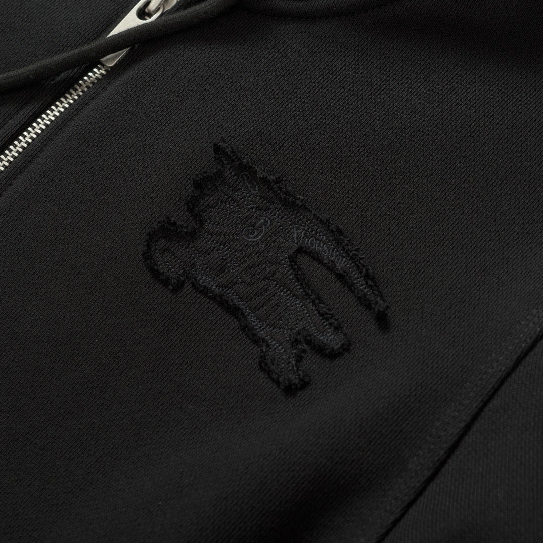 Schwarze und dunkelblaue Jacke