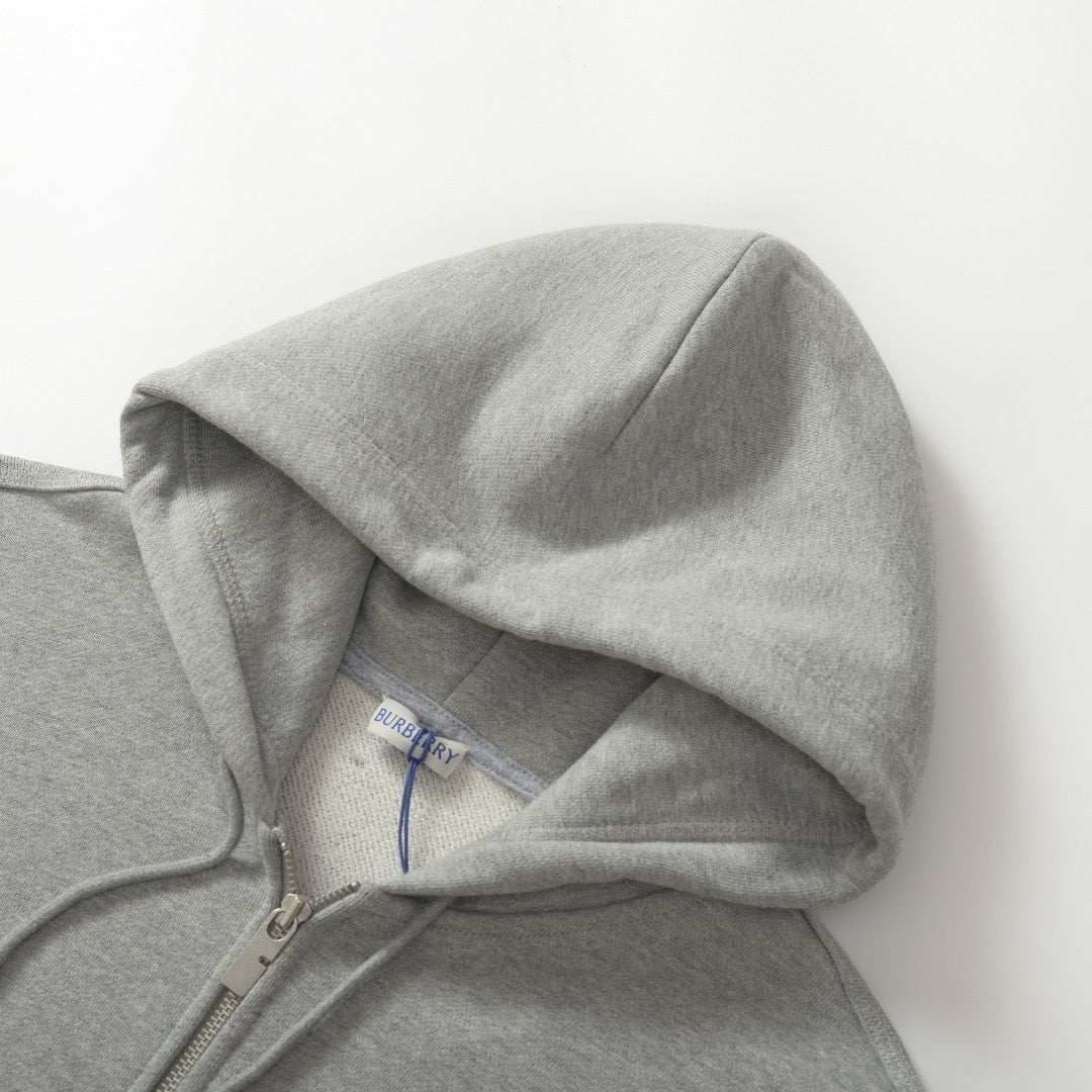 Schwarze und graue Jacke