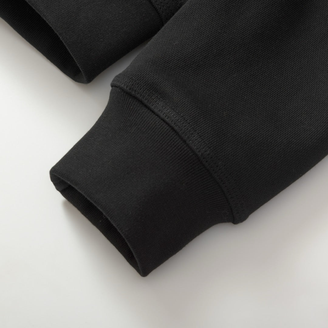 Schwarze und graue Jacke