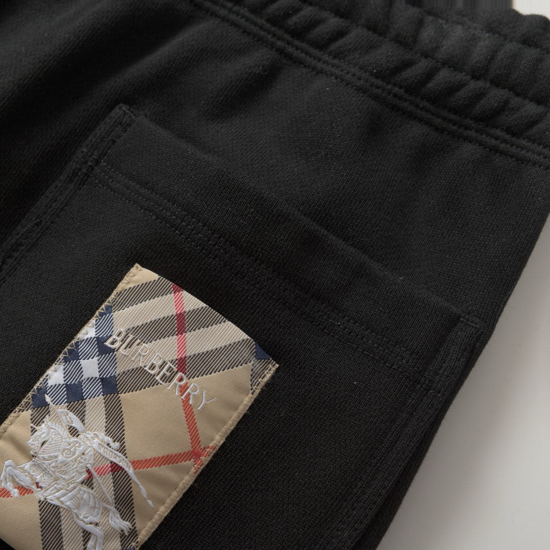 Schwarze und graue Hose