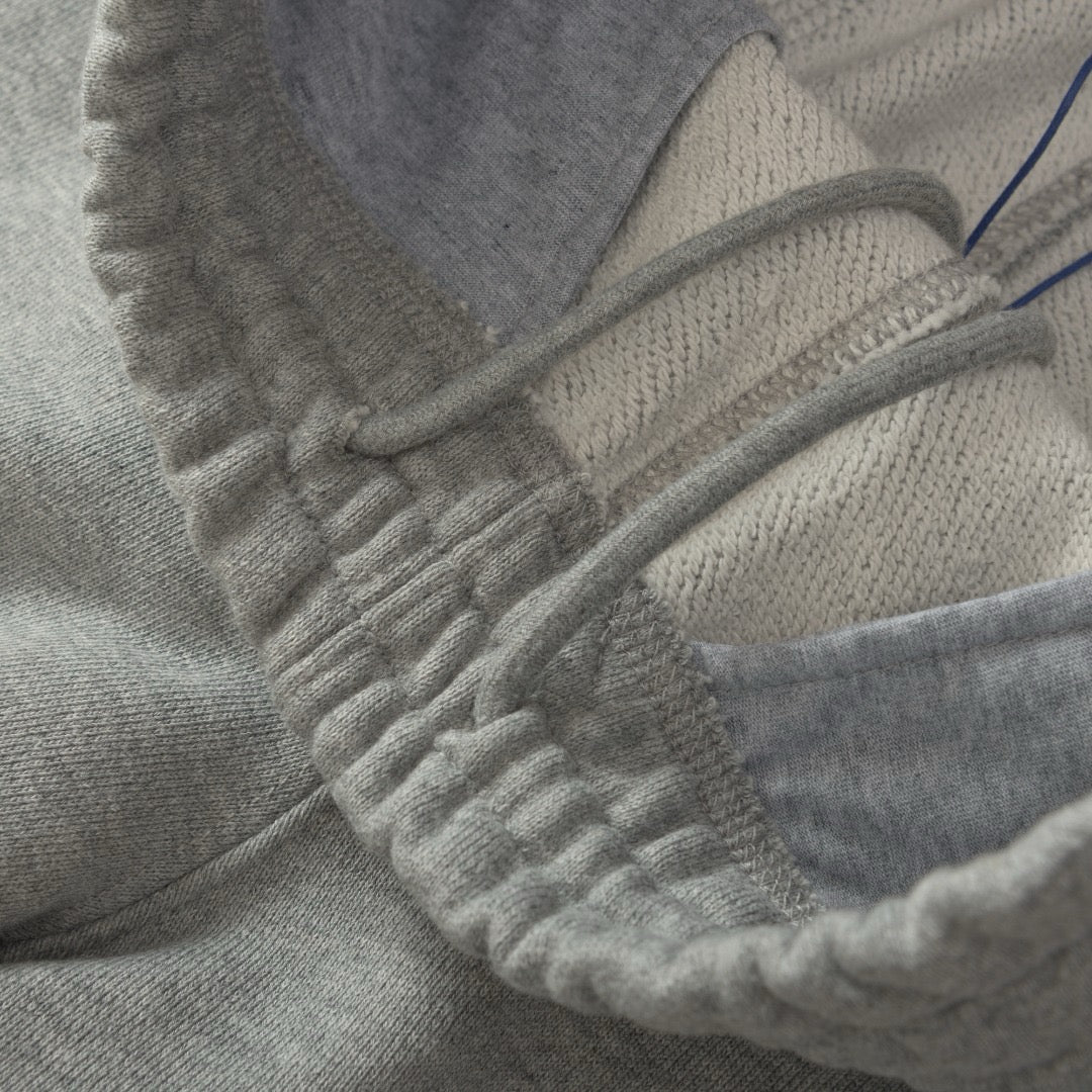 Schwarze und graue Hose