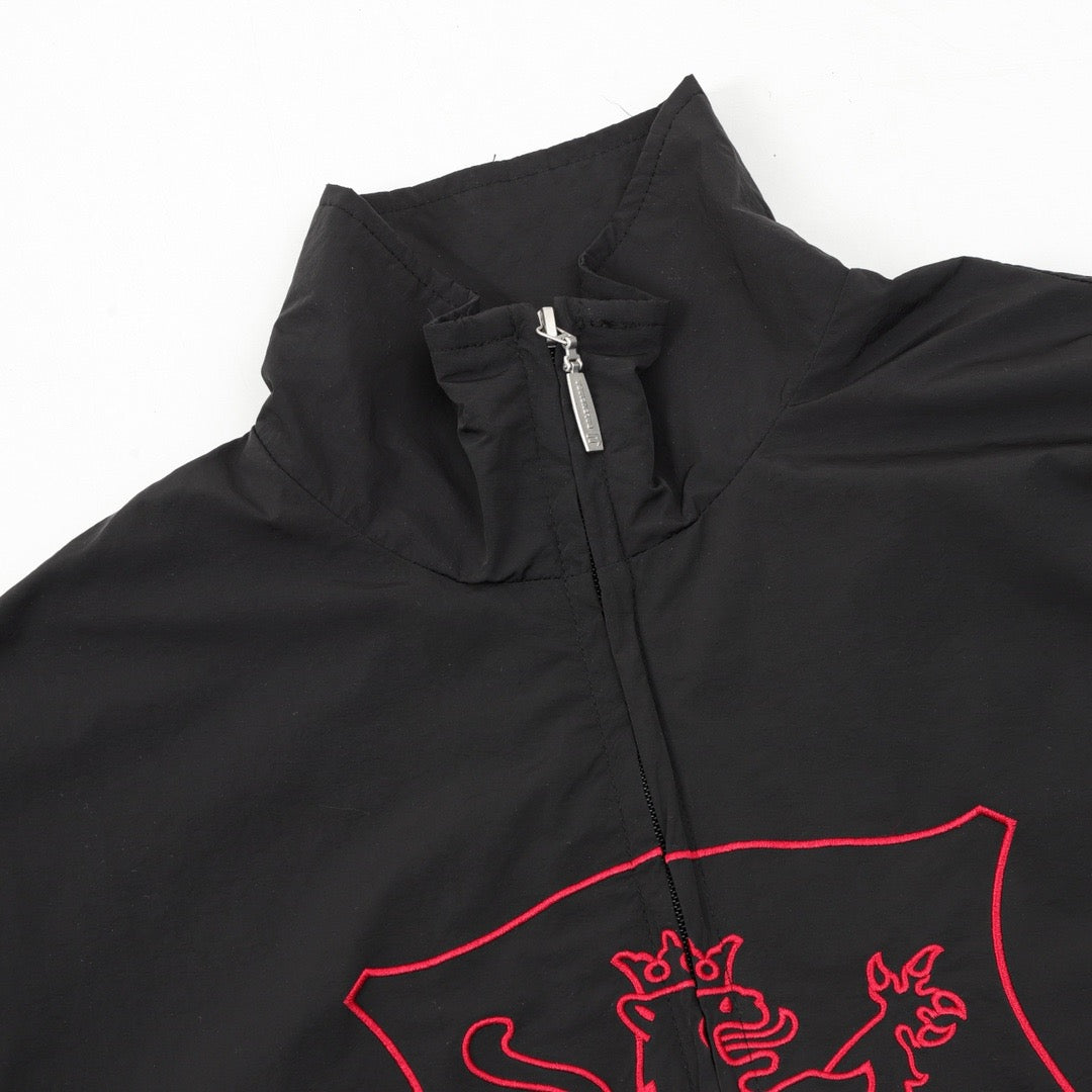 Schwarze und khakifarbene Jacke