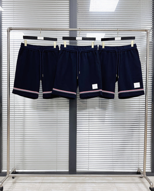 Pantalón corto azul oscuro y gris