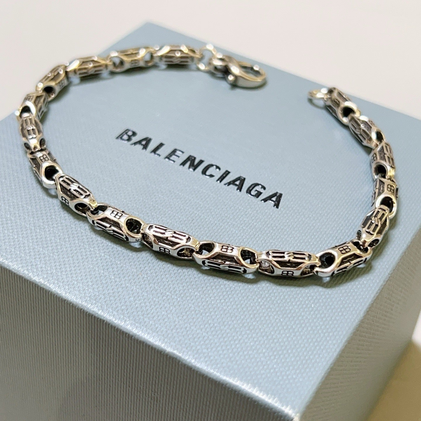 Silbernes schwarzes Armband