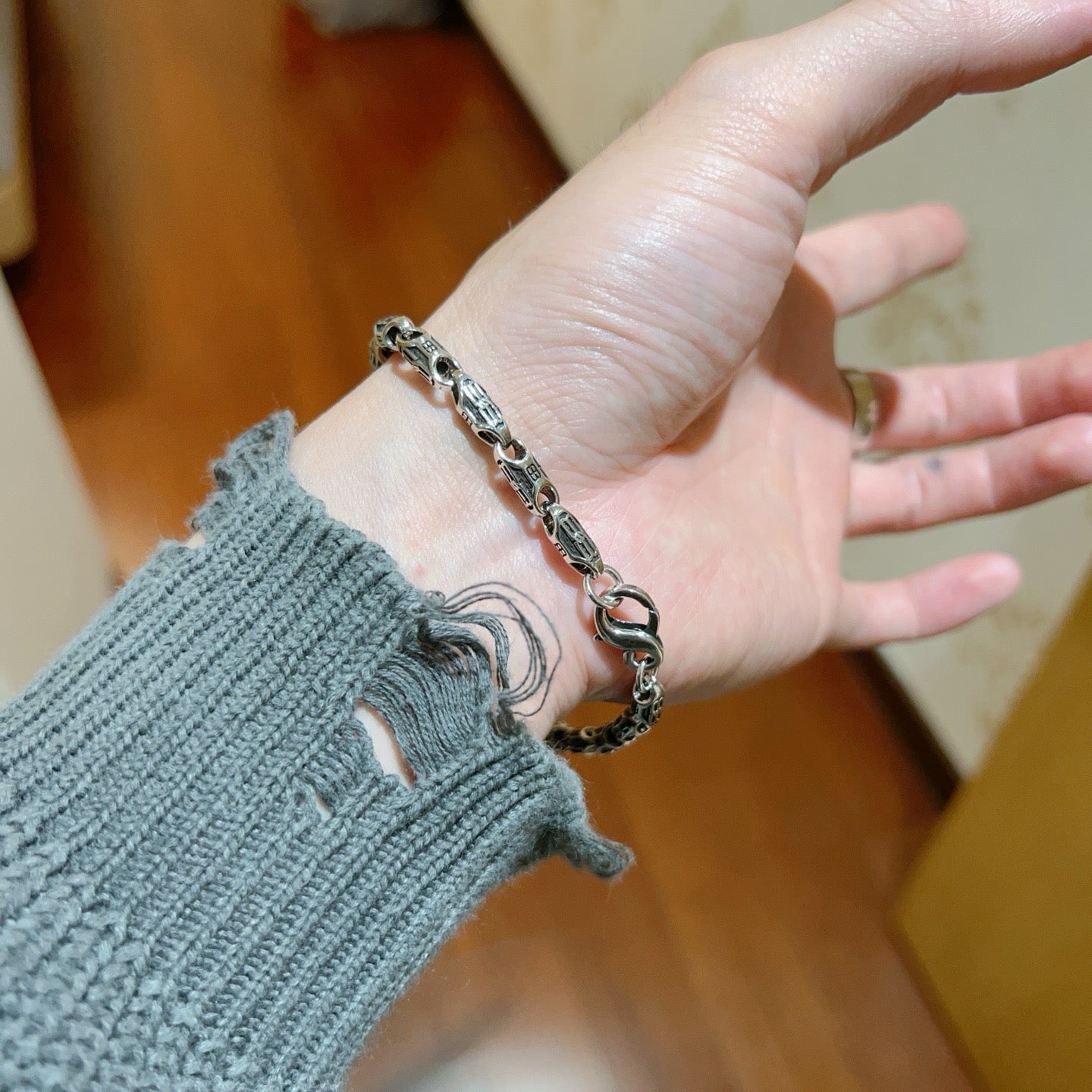 Silbernes schwarzes Armband