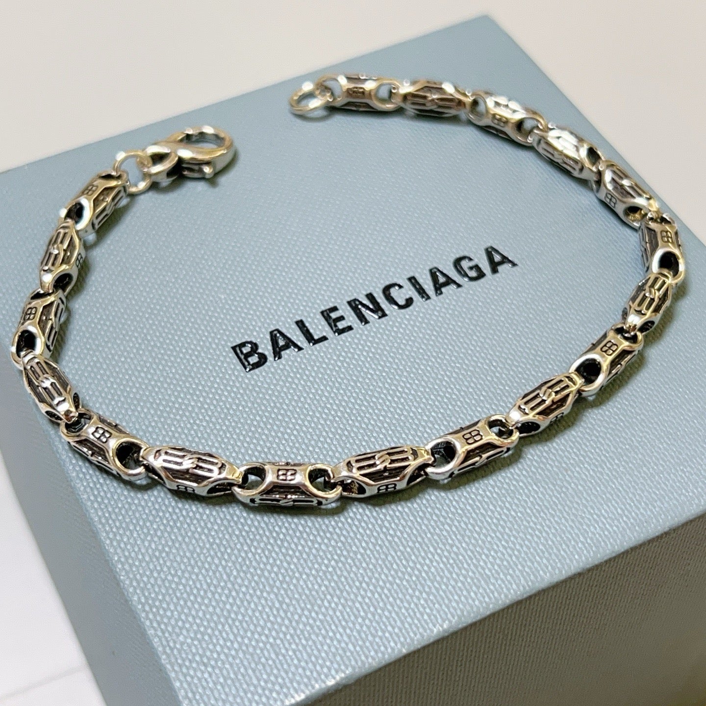 Silbernes schwarzes Armband