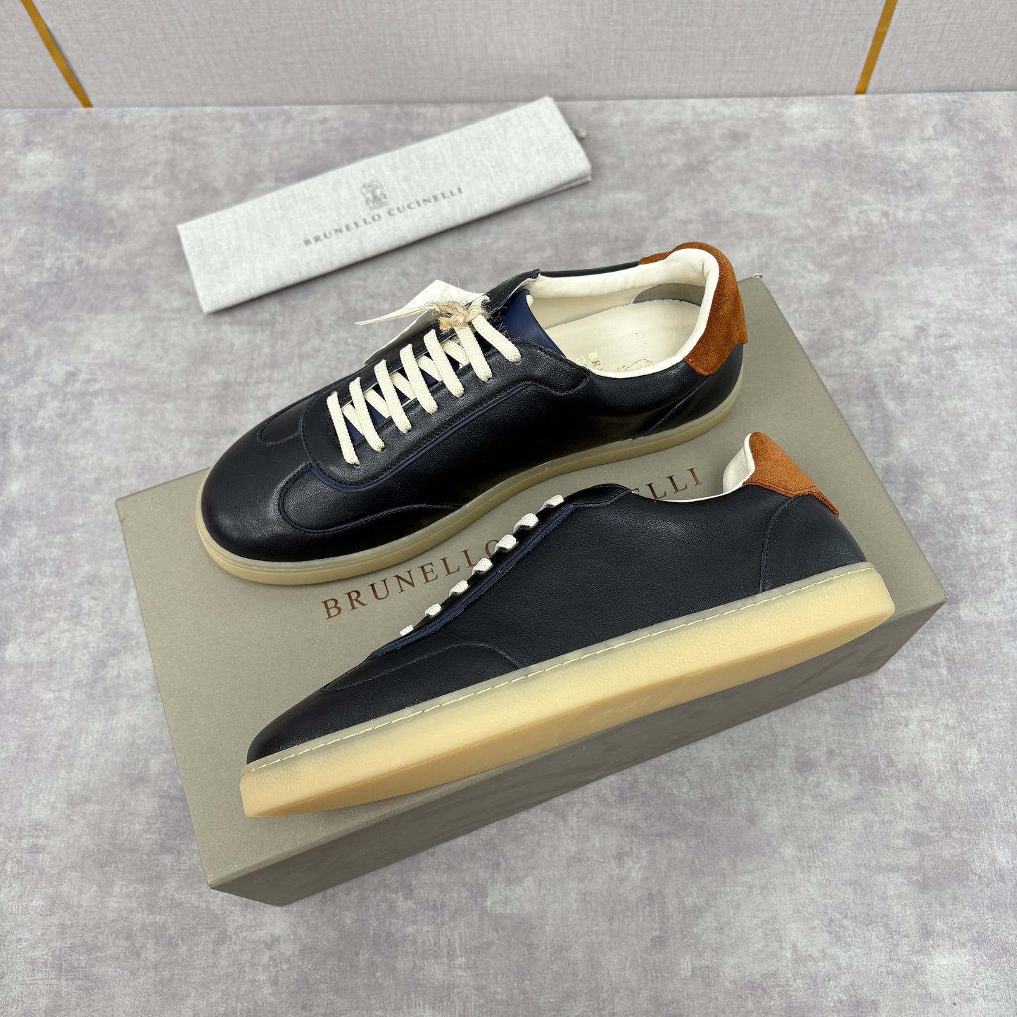 White, Black and Dark Brown Shoes