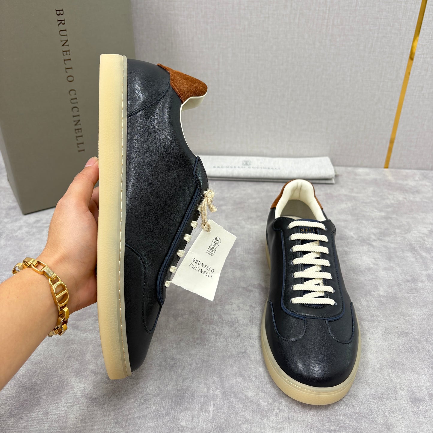 White, Black and Dark Brown Shoes