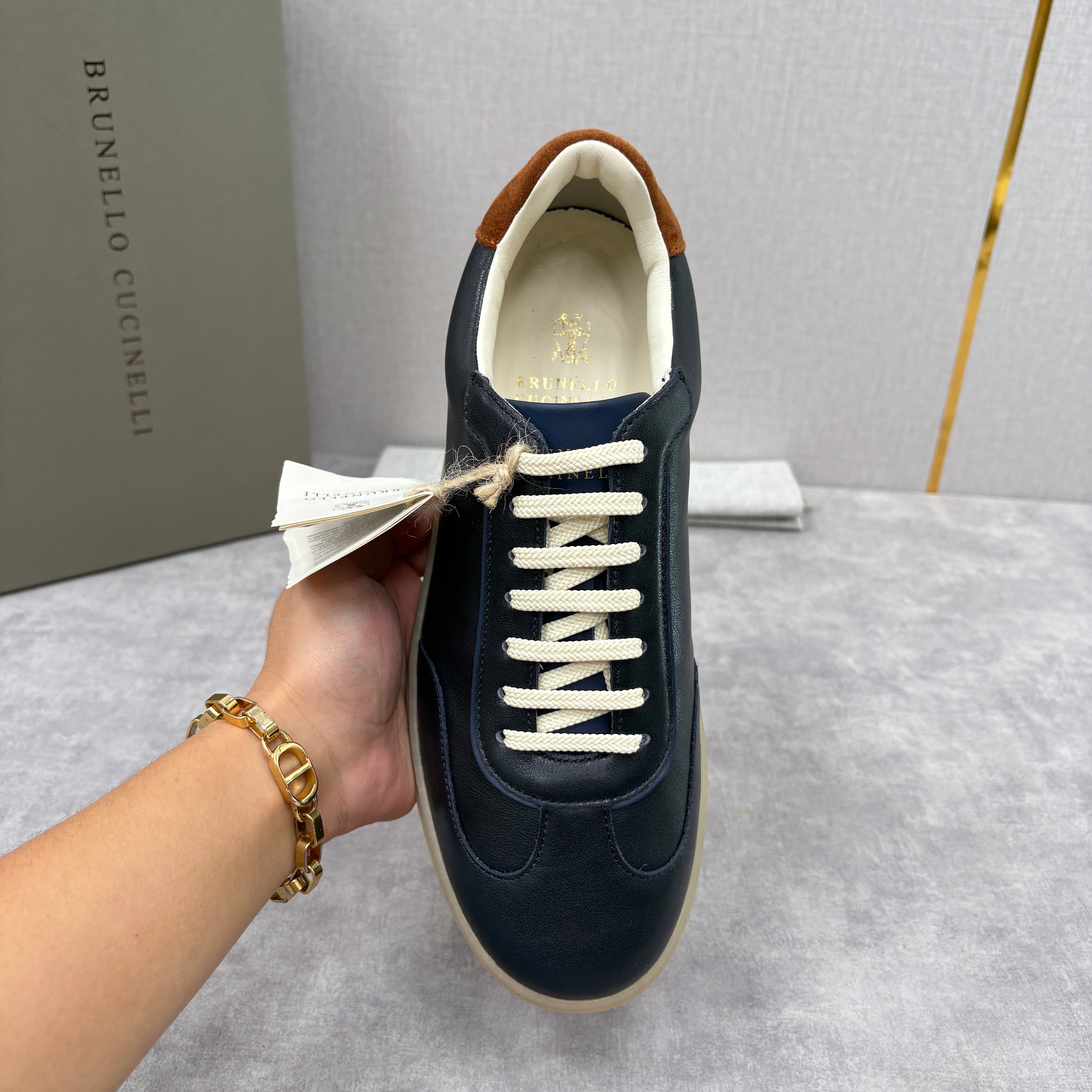 White, Black and Dark Brown Shoes