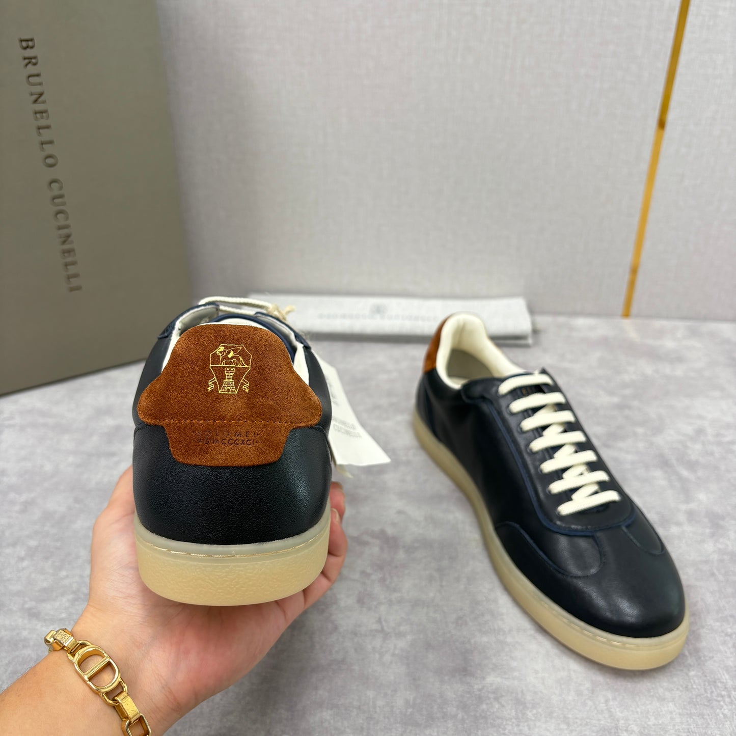 White, Black and Dark Brown Shoes