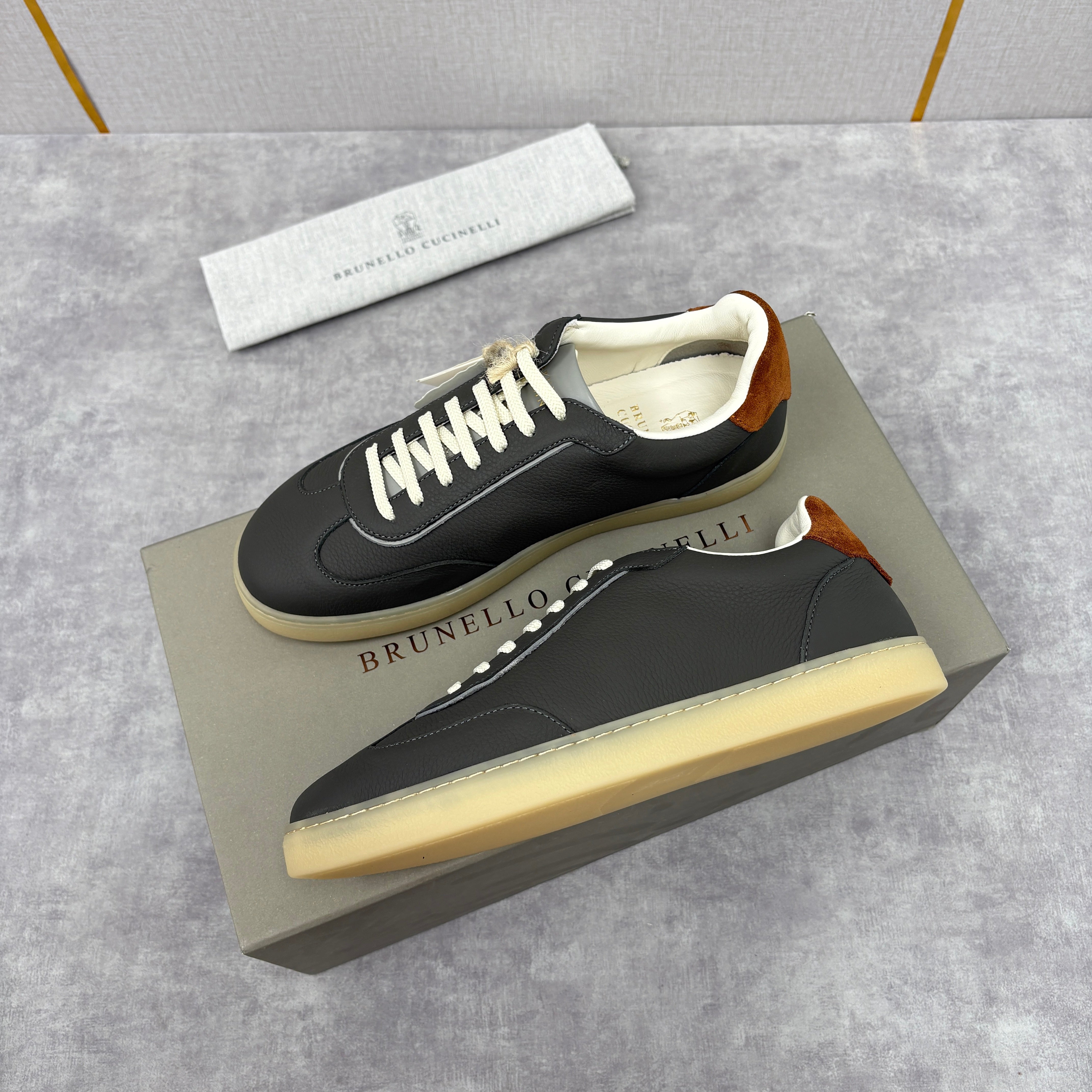White, Black and Dark Brown Shoes