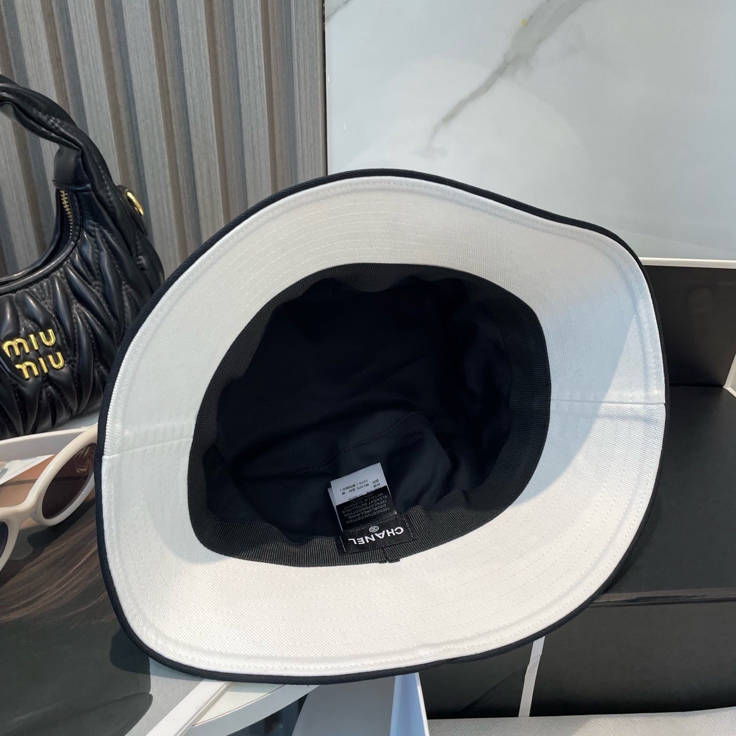 White, Navy blue and Black Hat