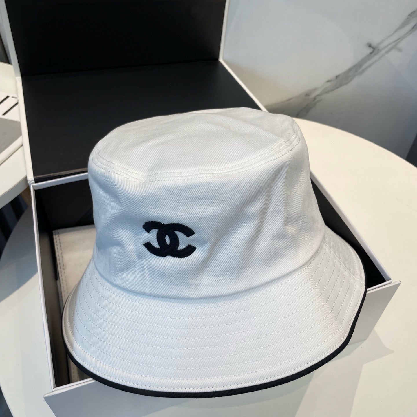 White, Navy blue and Black Hat