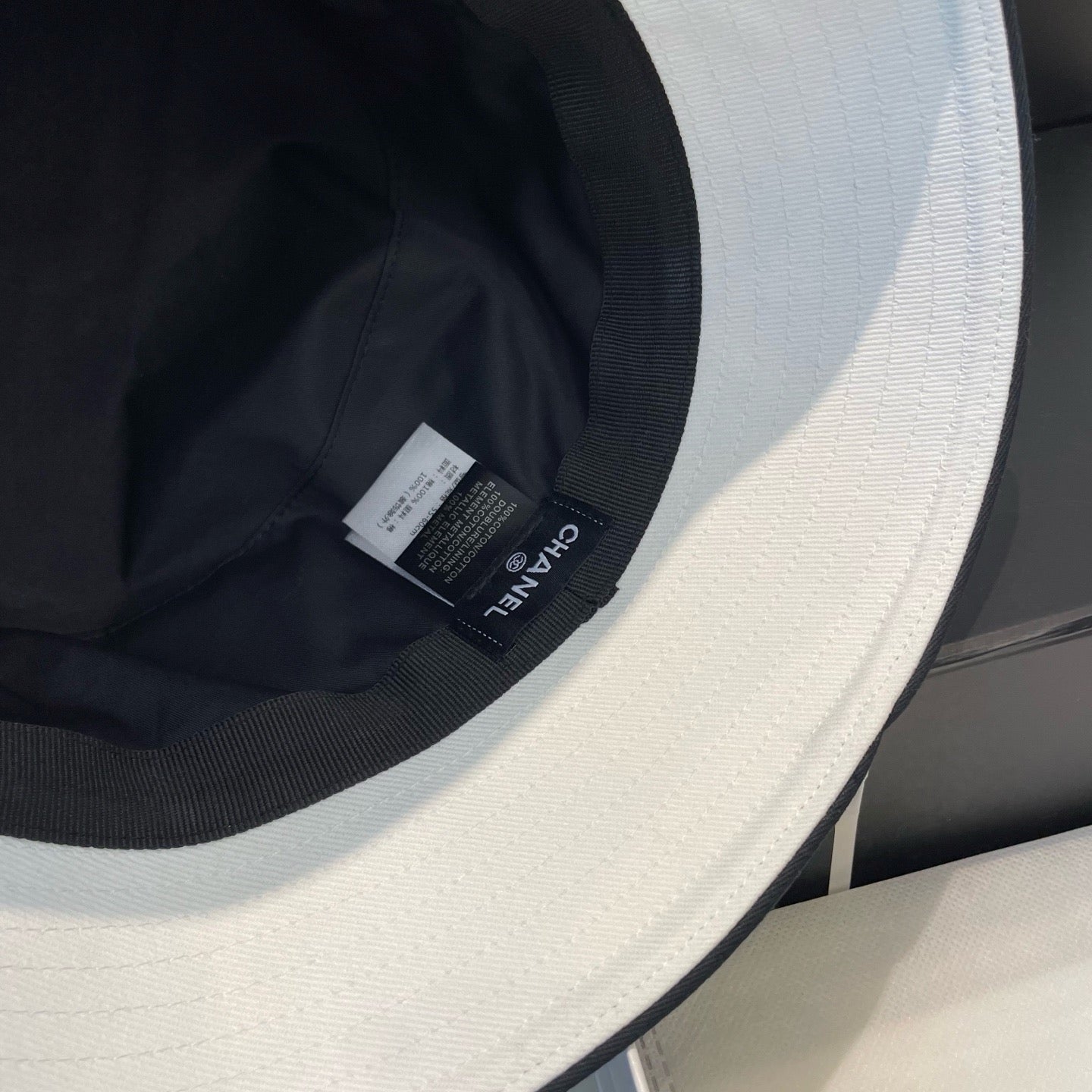 White, Navy blue and Black Hat