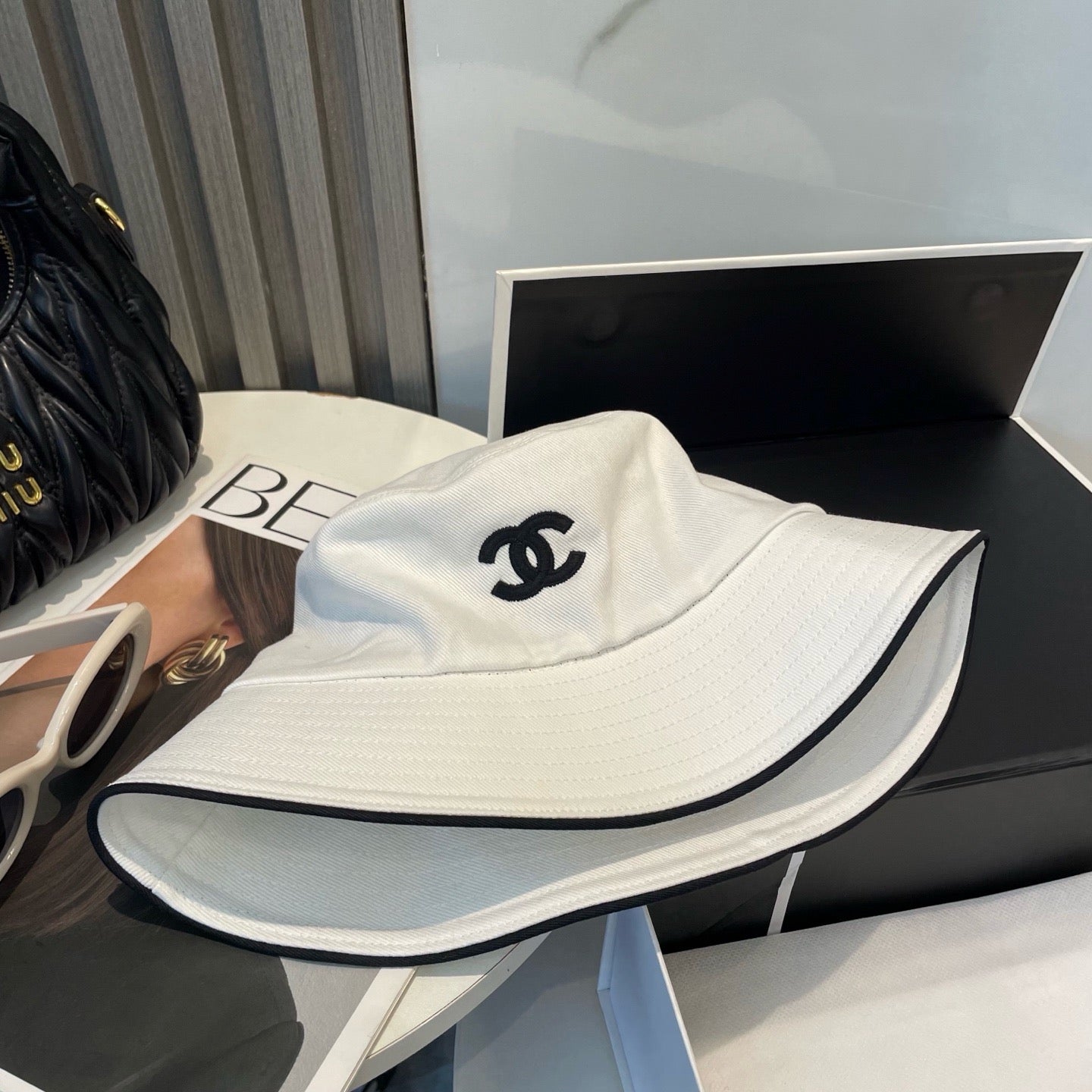 White, Navy blue and Black Hat