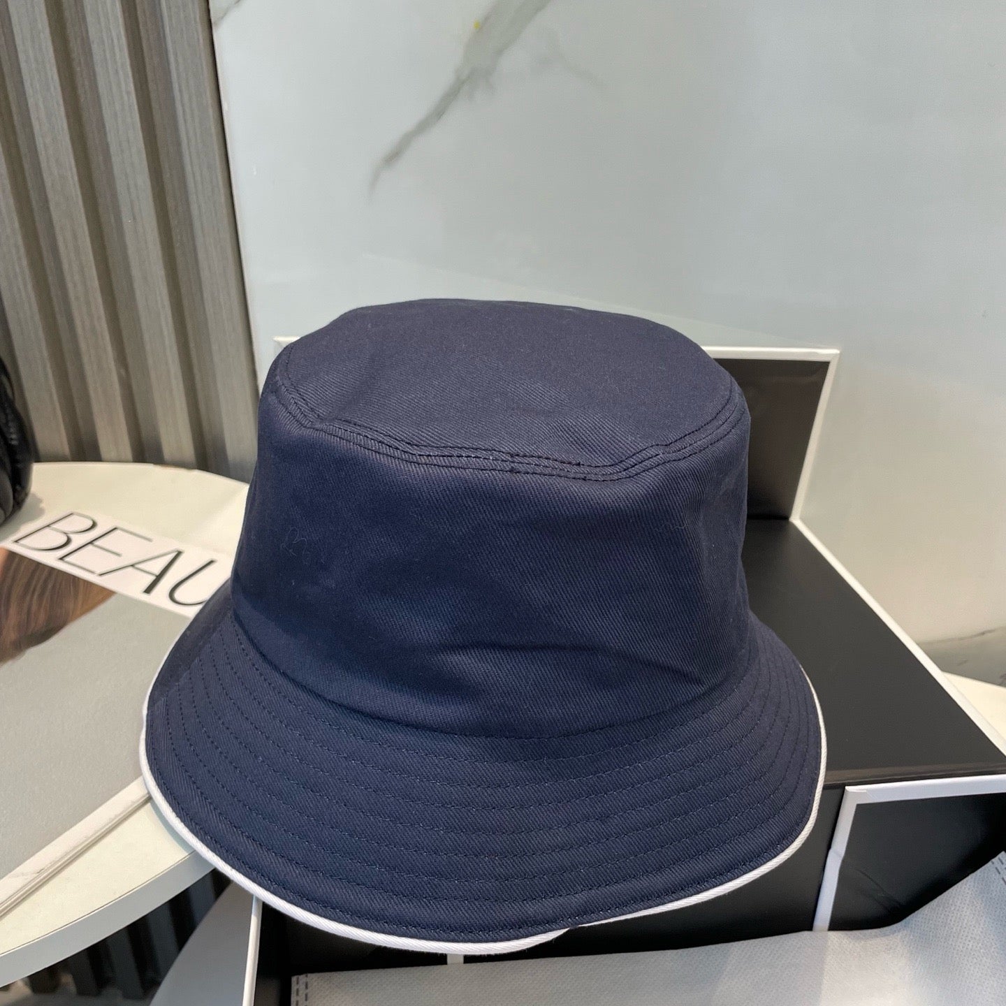 White, Navy blue and Black Hat