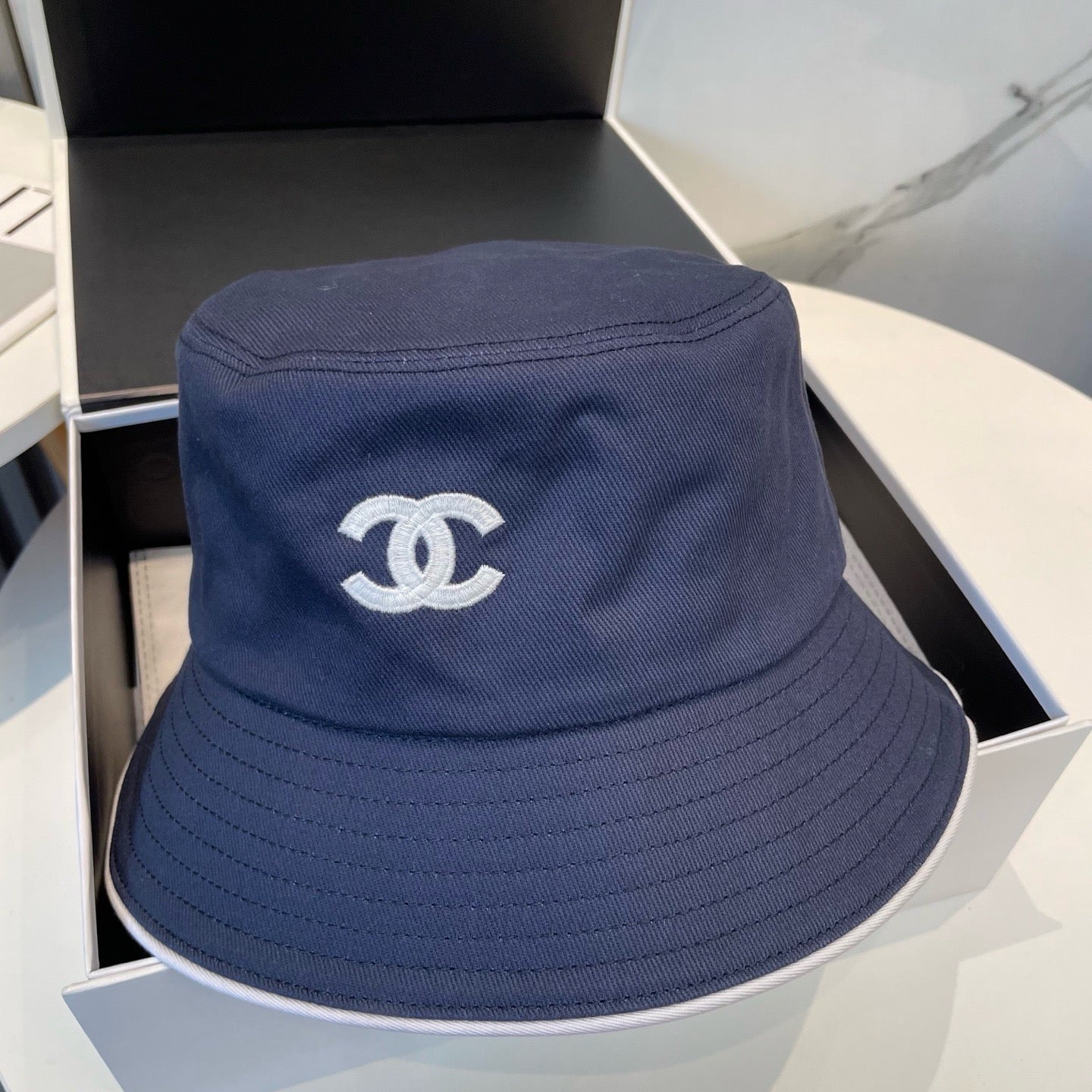 White, Navy blue and Black Hat