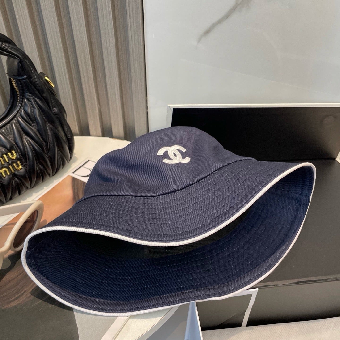 White, Navy blue and Black Hat