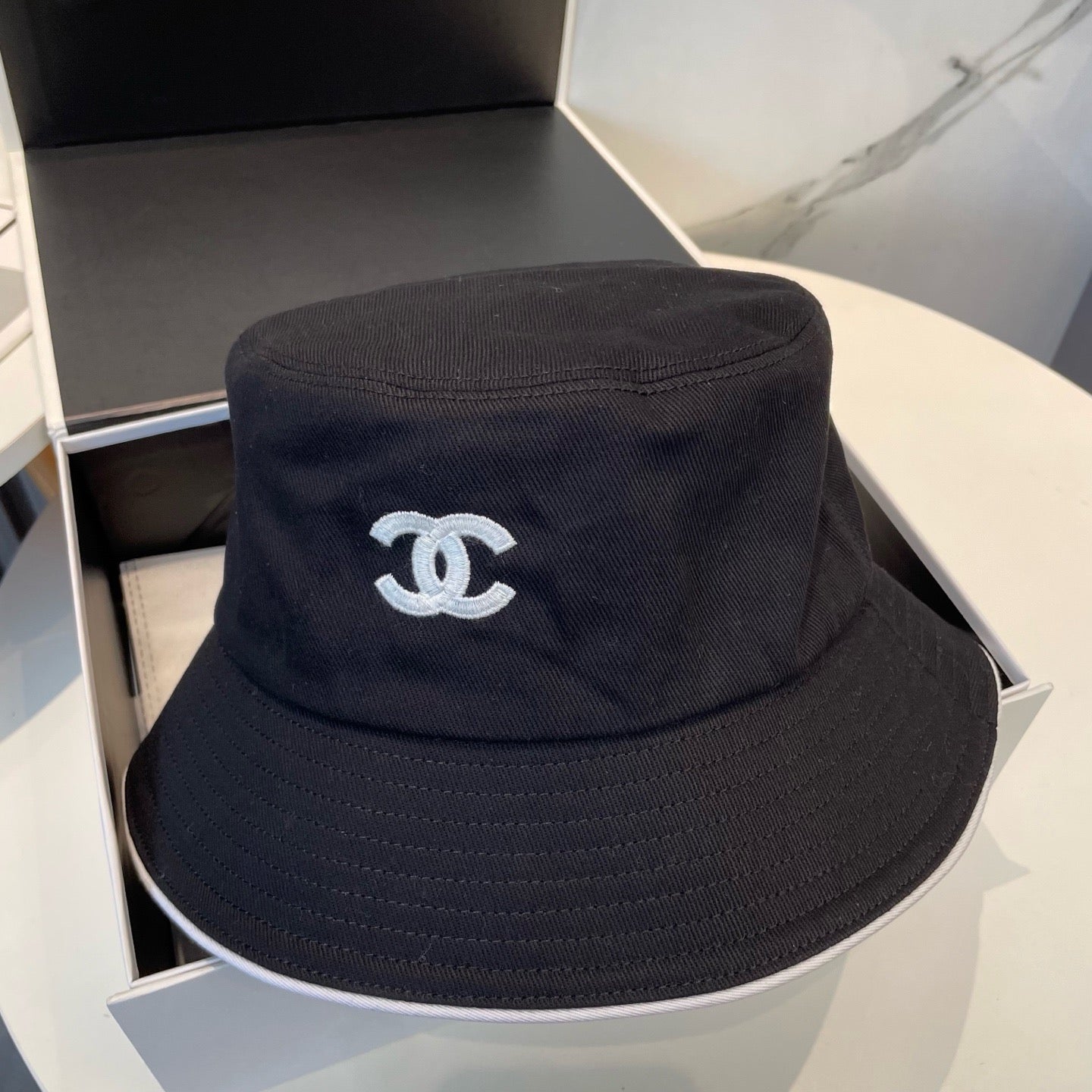 White, Navy blue and Black Hat