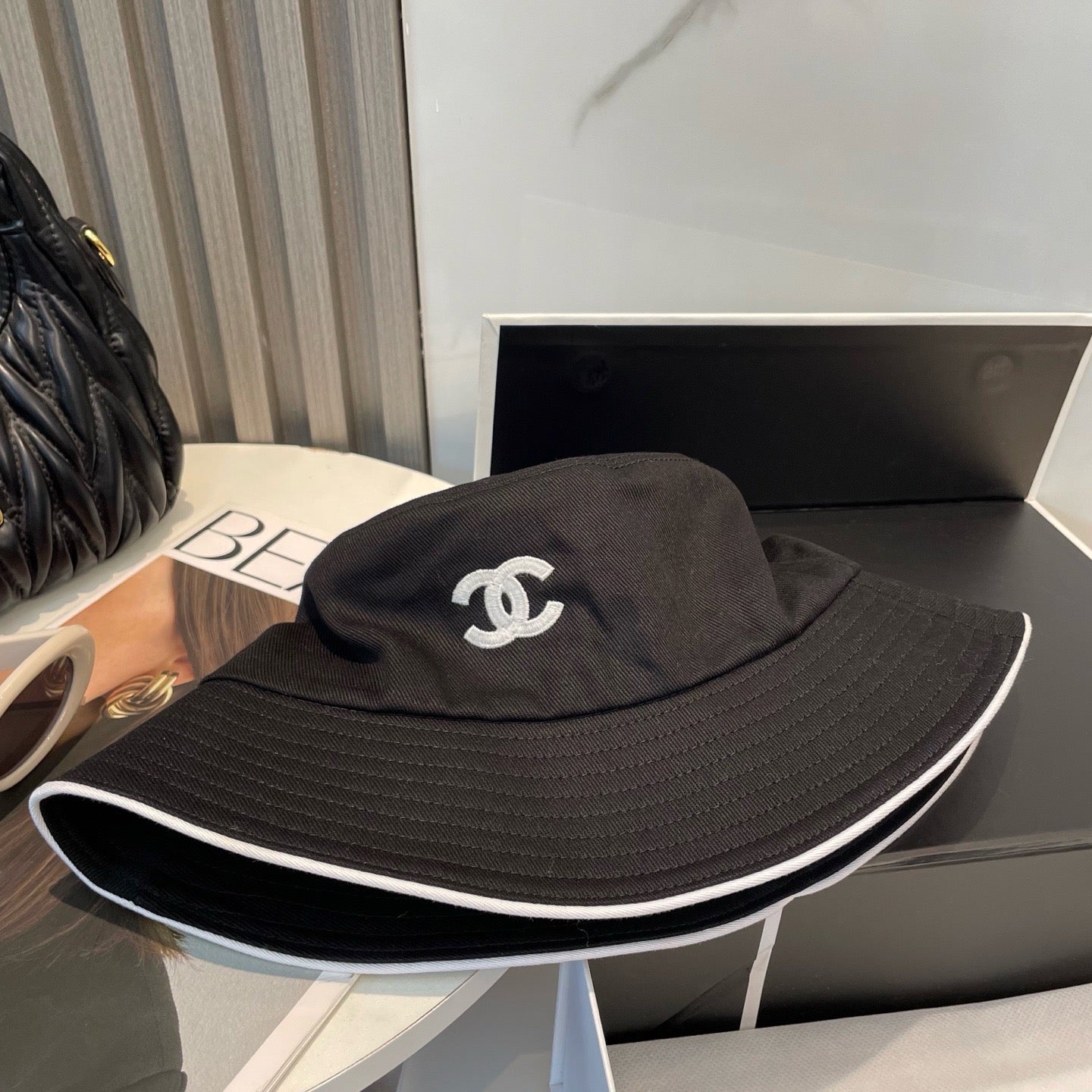 White, Navy blue and Black Hat