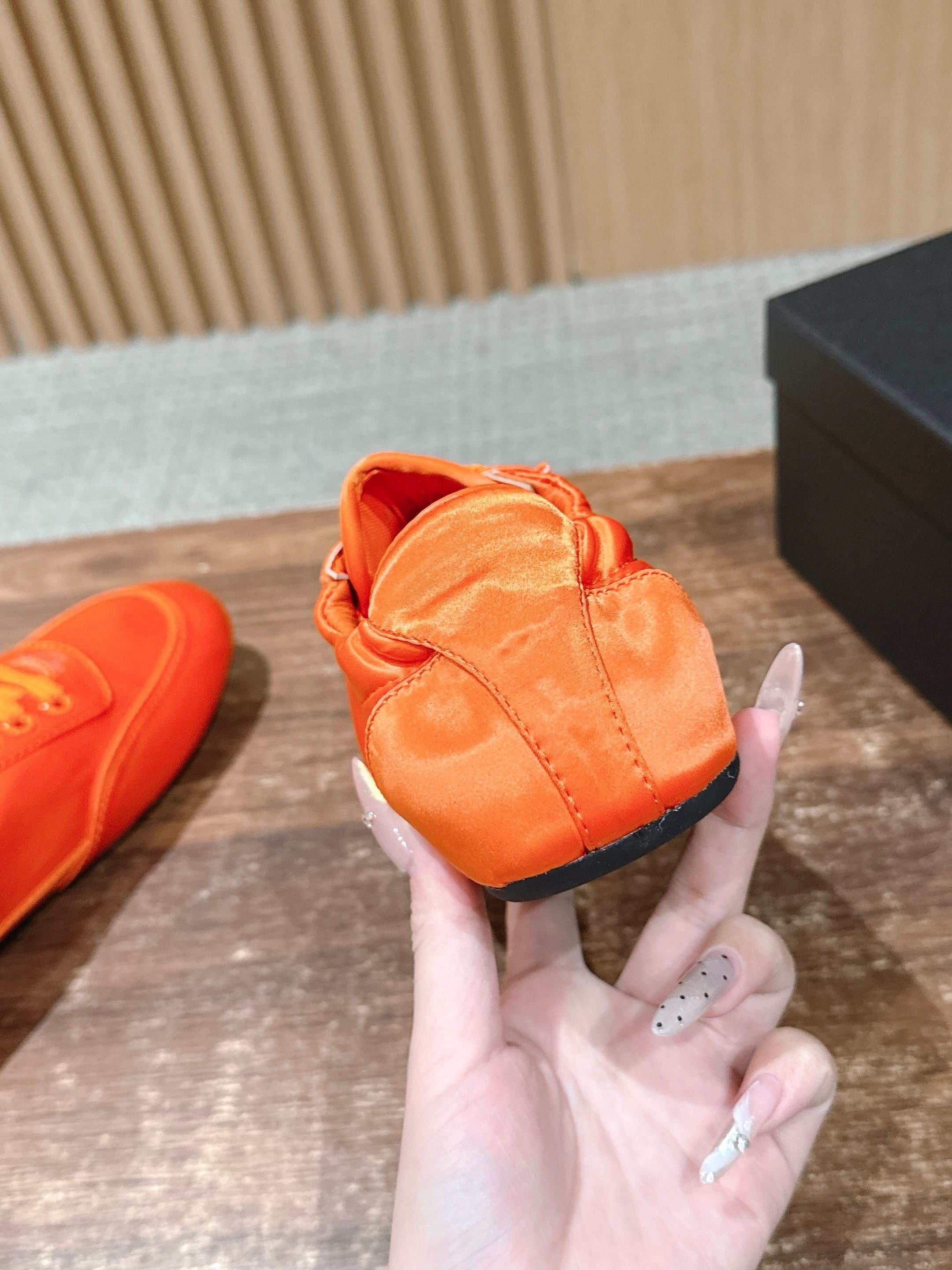 Black, Orange and Pink Shoes