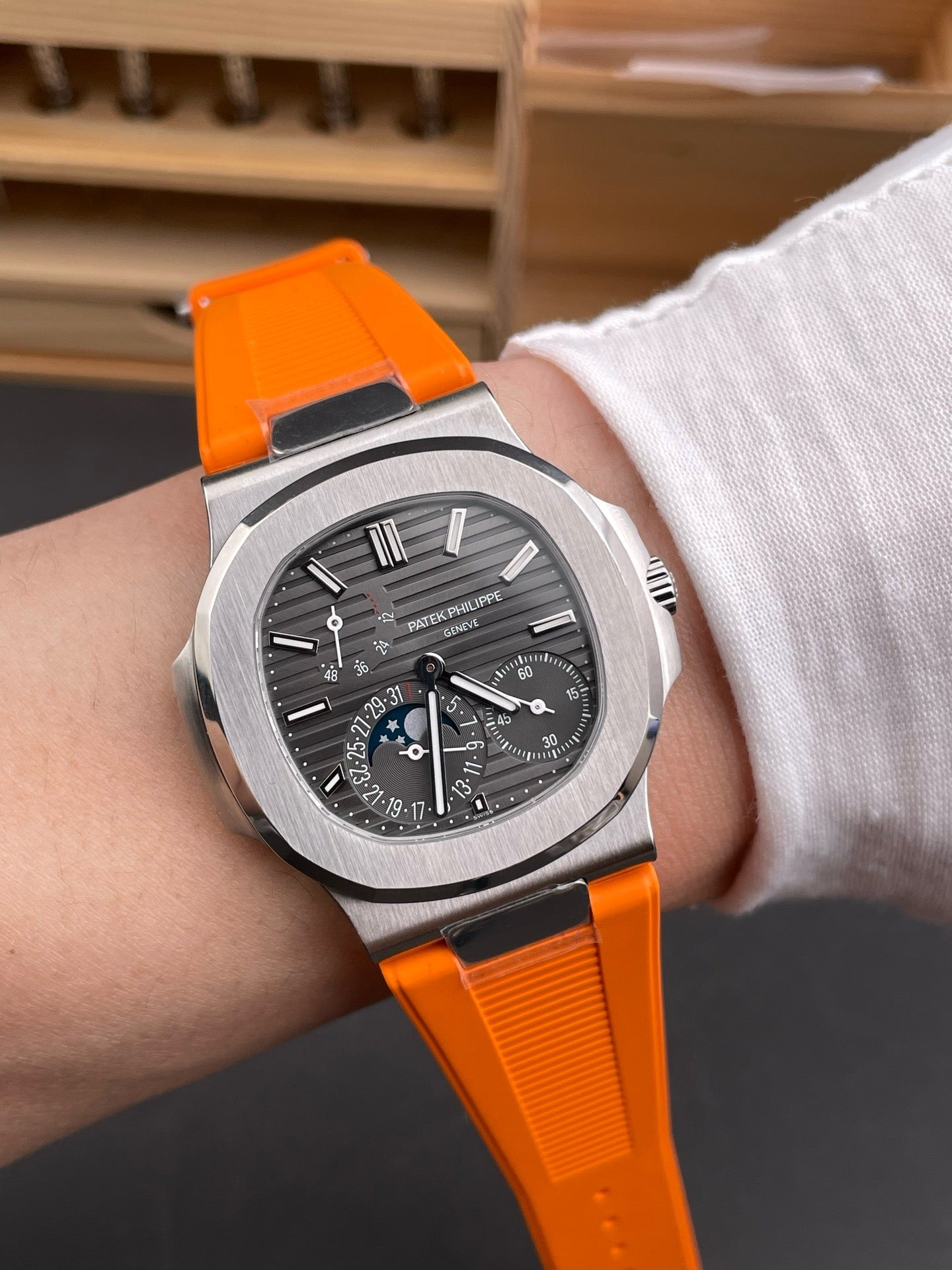Orange black silver and Black silver Watch