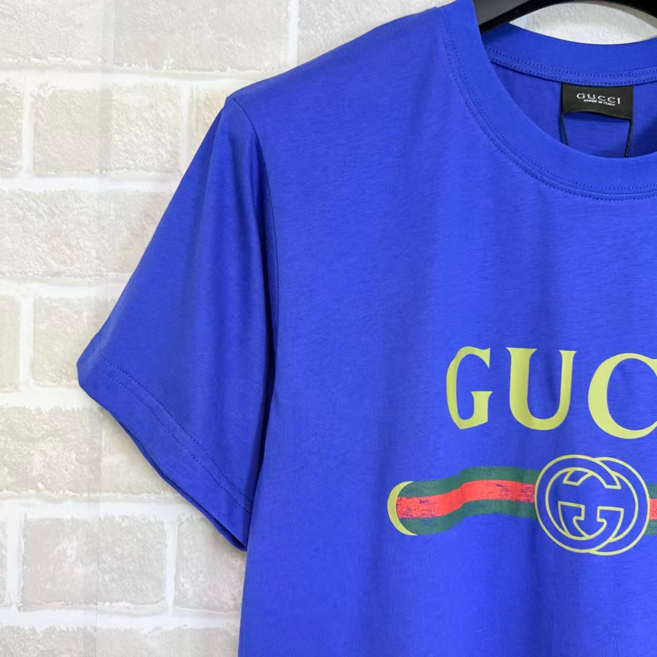 White, Black, Blue and Red T-Shirt