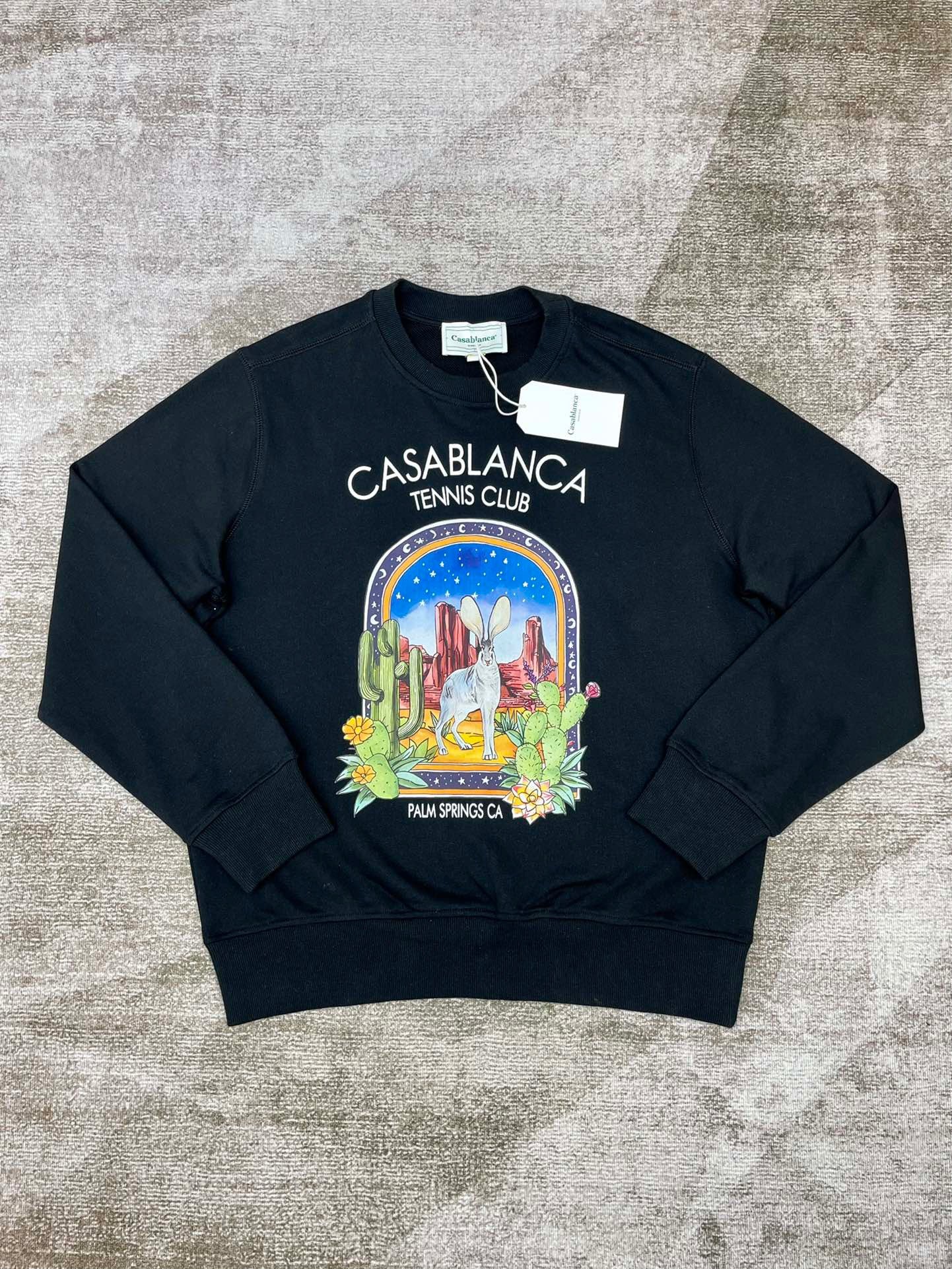 Schwarzes und himmelblaues Sweatshirt
