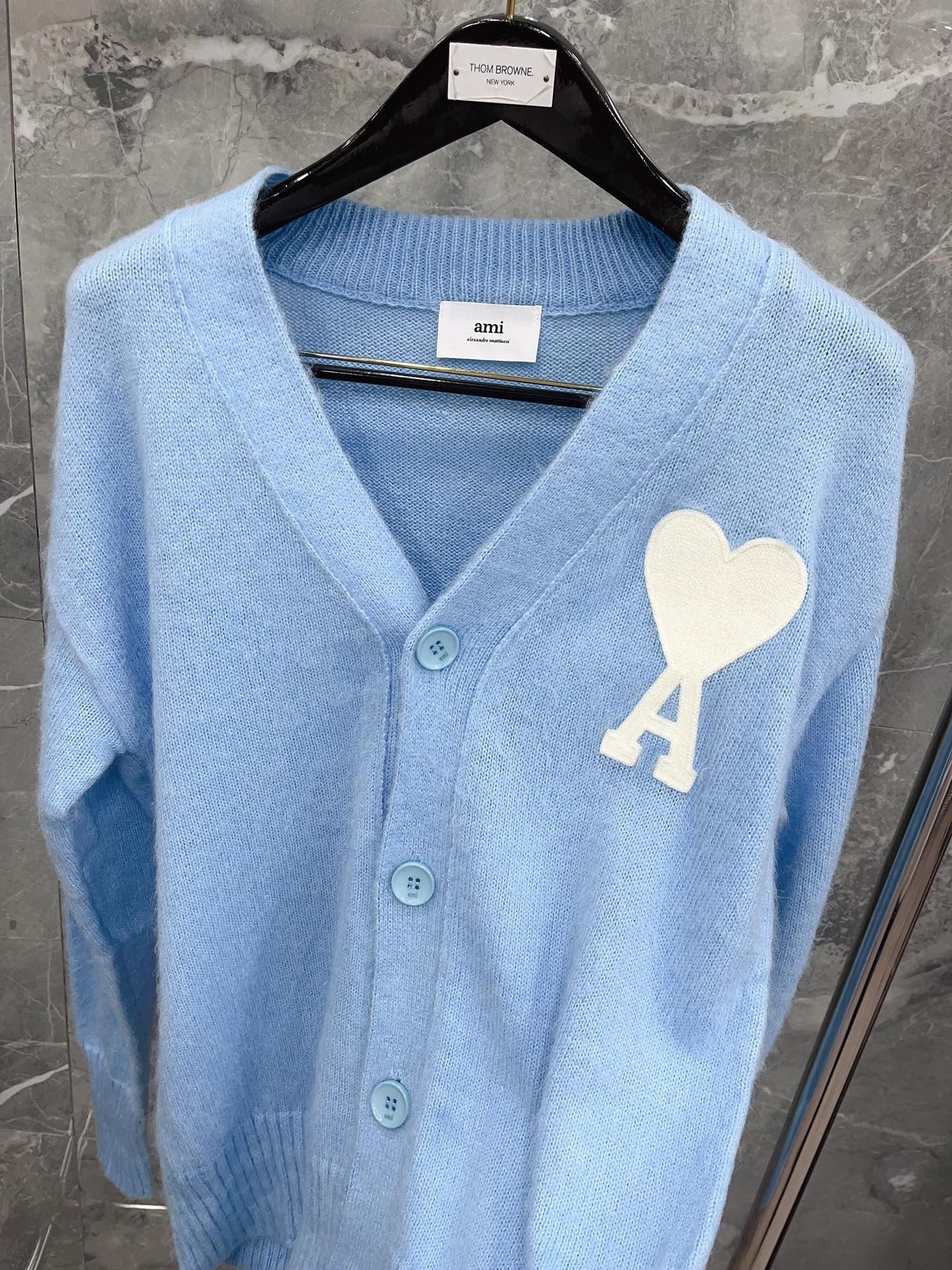 Rosa und hellblaue Jacke