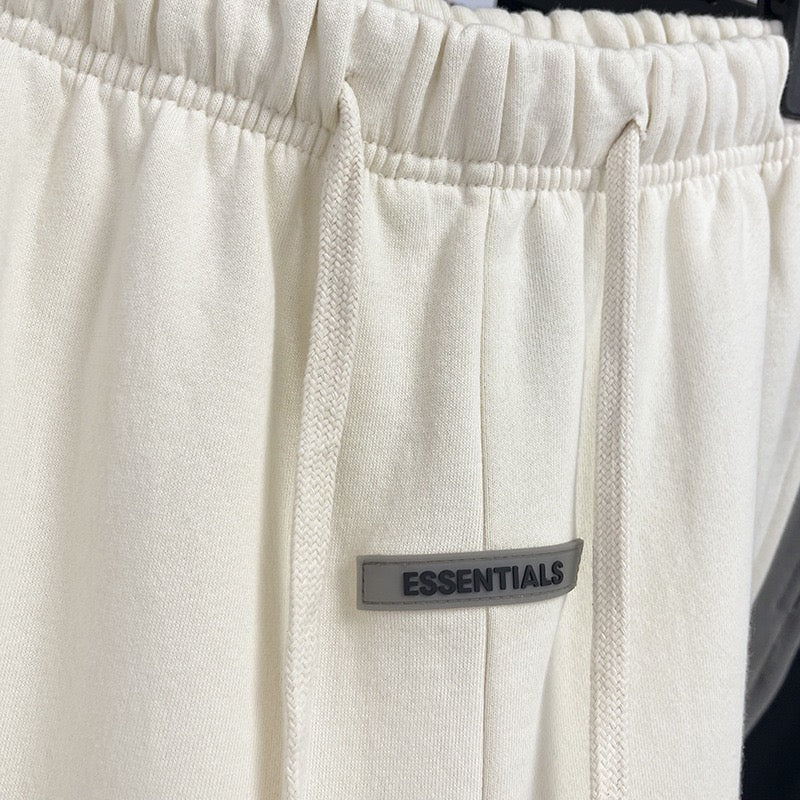 Schwarze, weiße und graue Hose