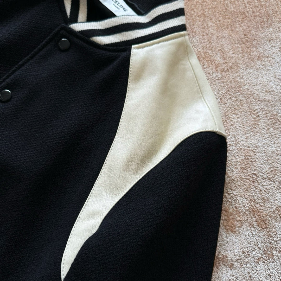 Schwarze weiße Jacke