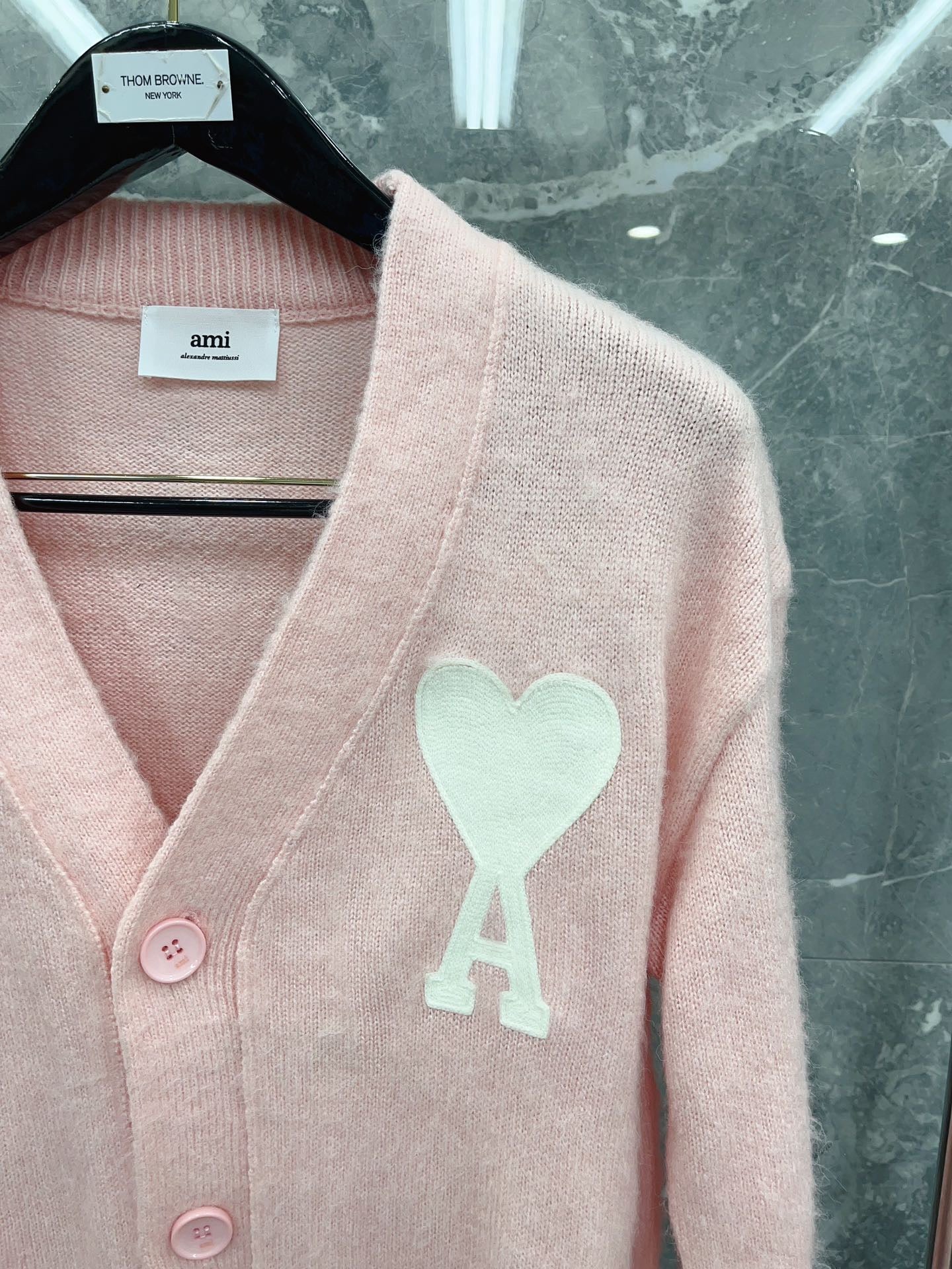 Rosa und hellblaue Jacke