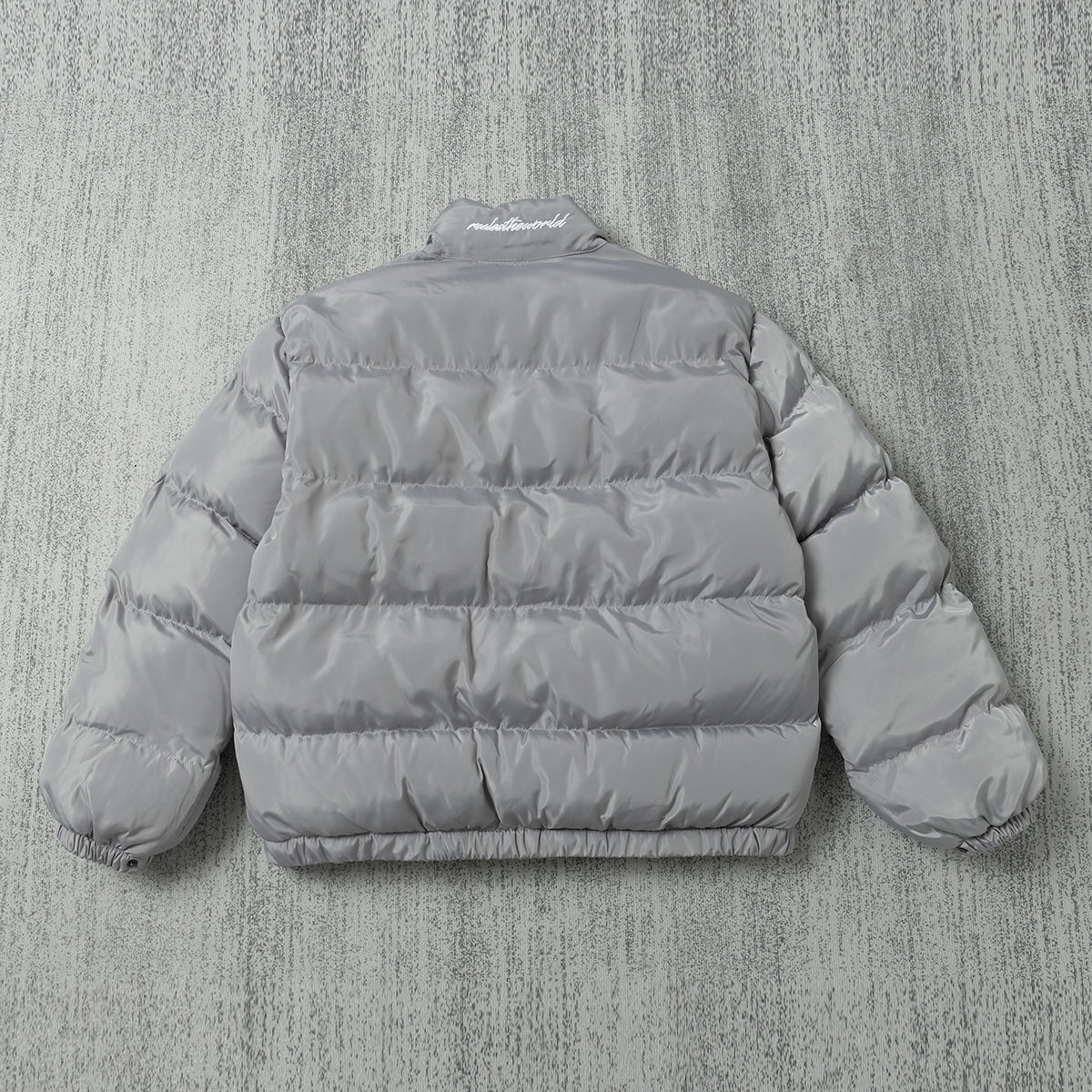 Schwarze und graue Jacke