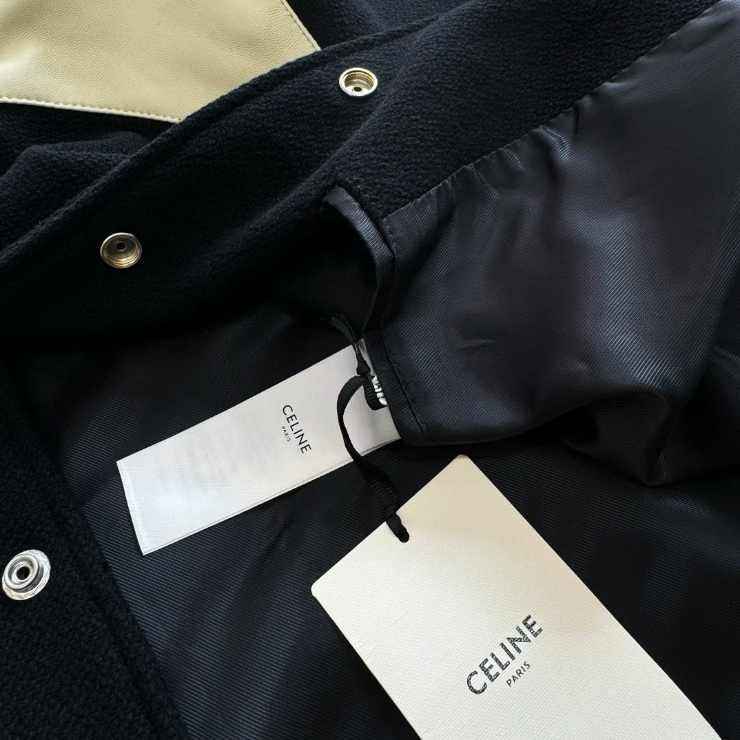 Schwarze weiße Jacke