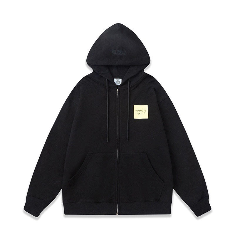 Schwarze und graue Jacke