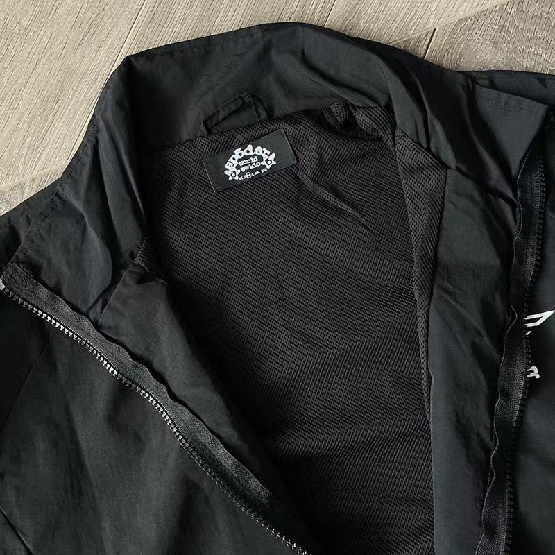 Schwarze und blaue Jacke mit Hose