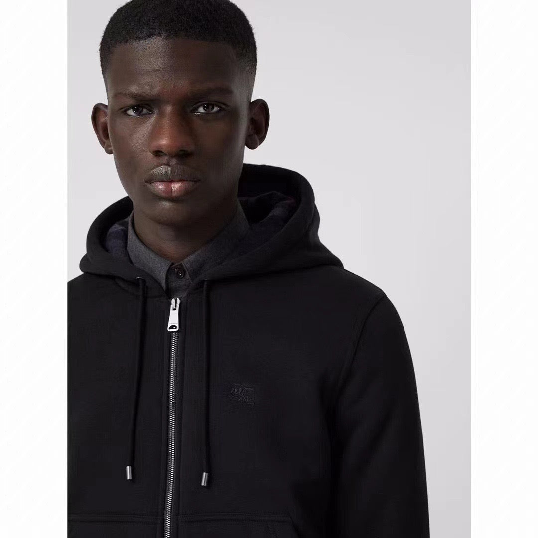 Schwarze und graue Jacke