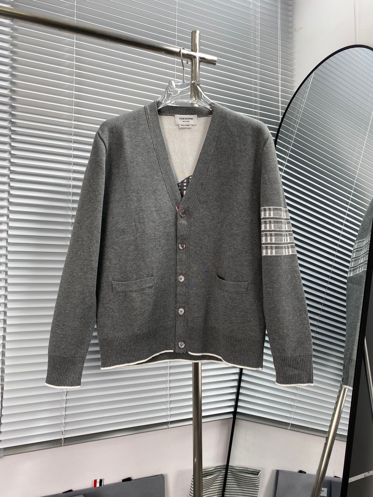 Chaqueta azul y gris