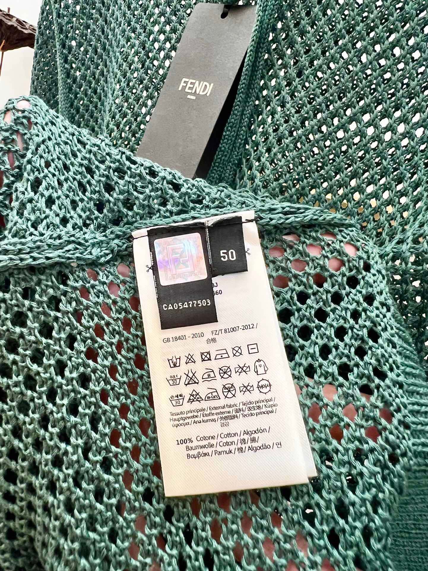 تي شيرت أخضر ورمادي