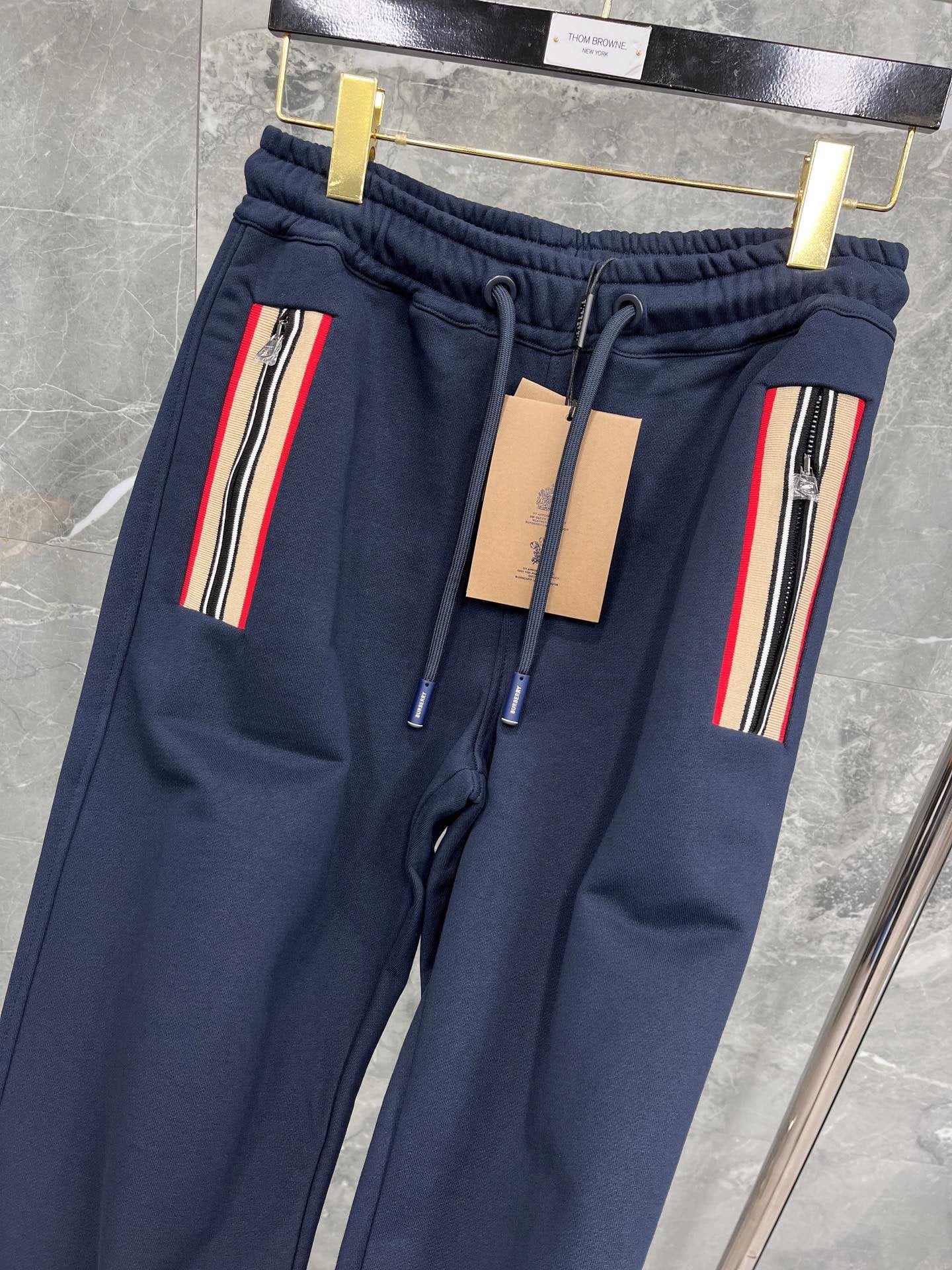 Schwarze, blaue und graue Hose