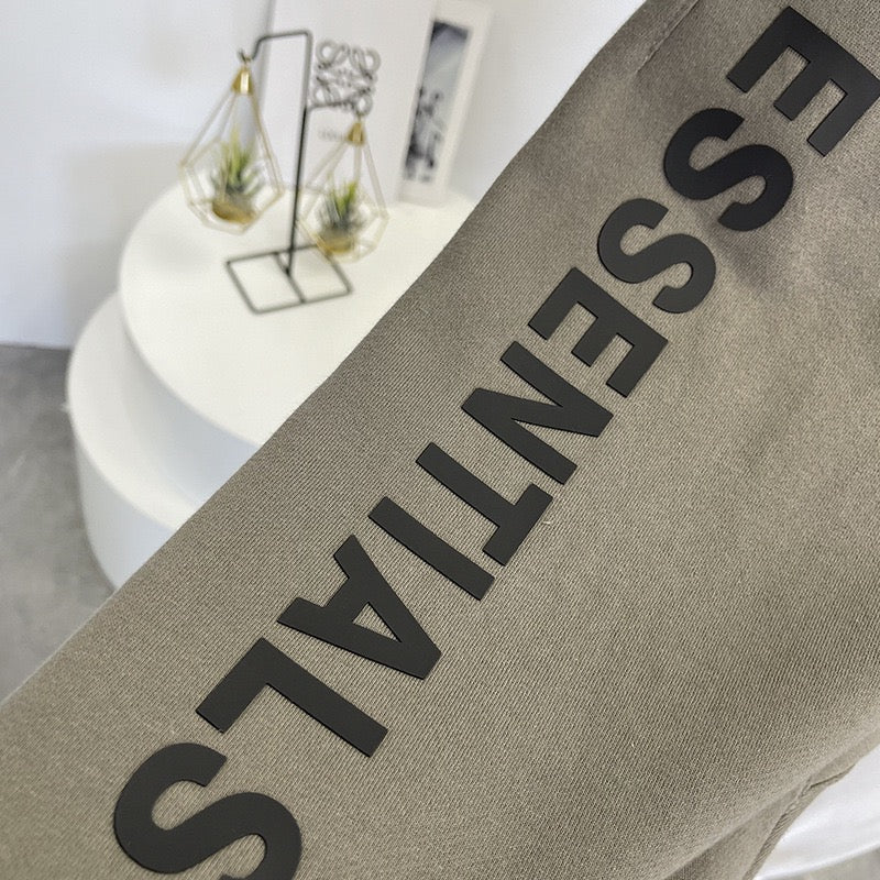 Schwarze, weiße und graue Hose