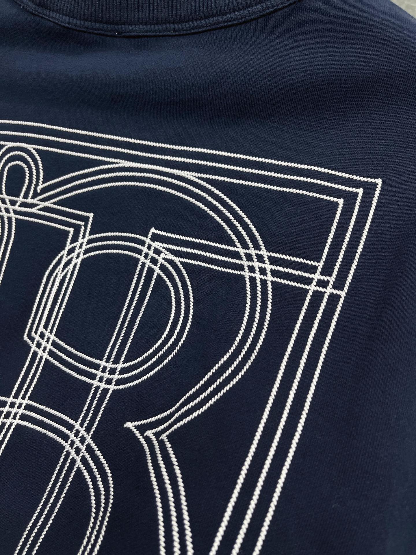 جيرسي أسود وأزرق داكن وبرتقالي