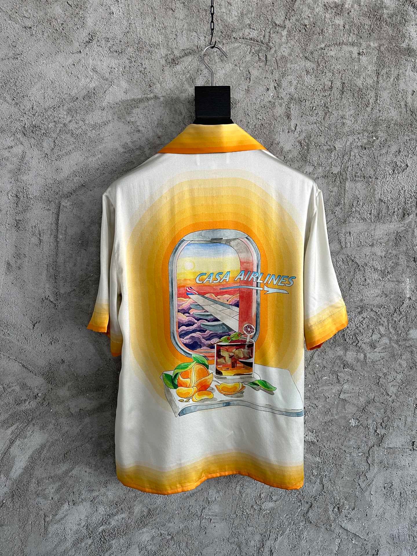 قميص أبيض برتقالي