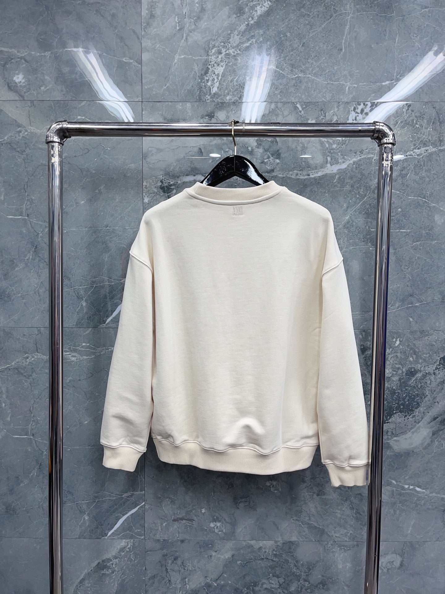 Jersey negro, gris y blanco