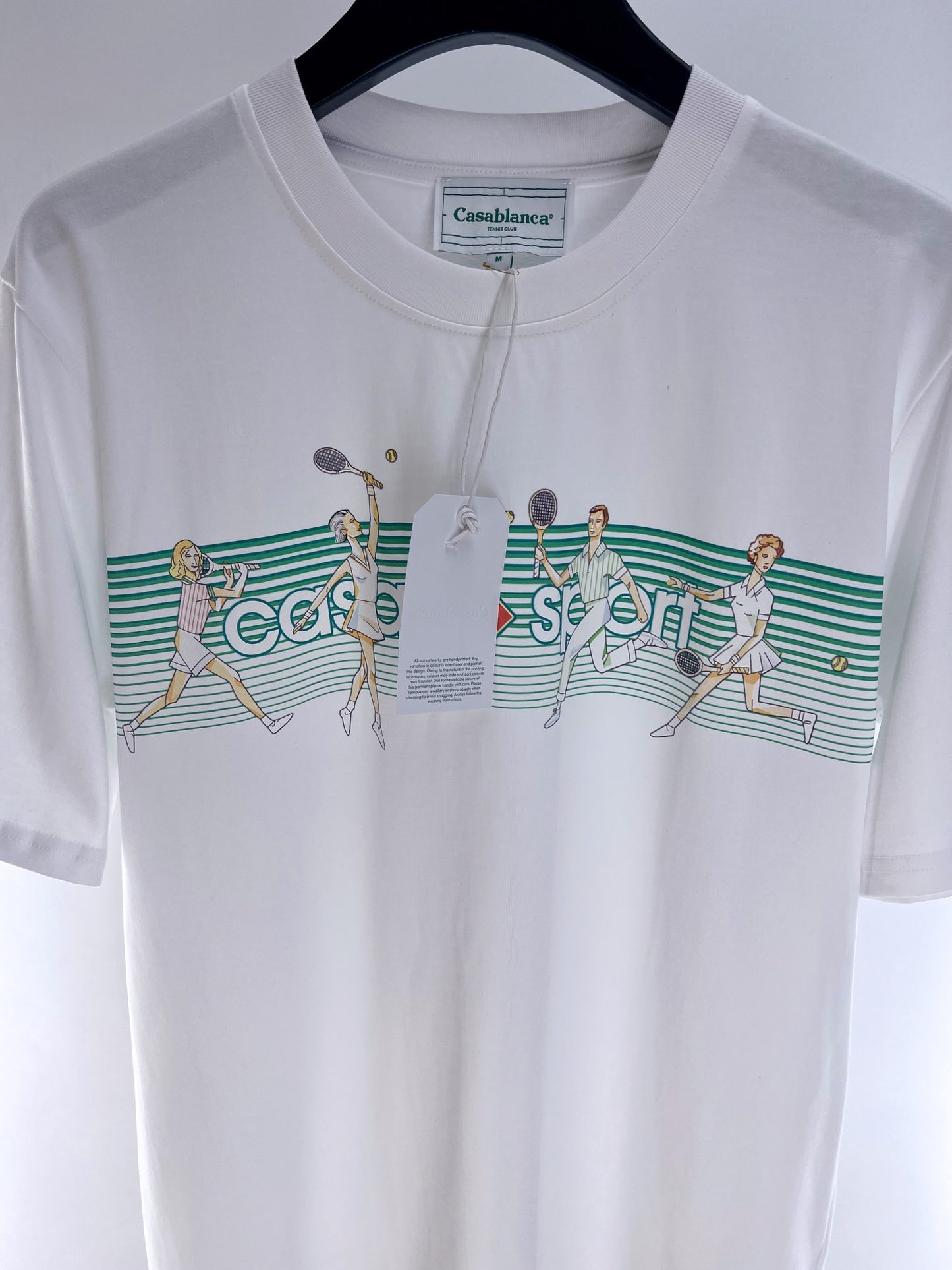 Camiseta azul y blanca