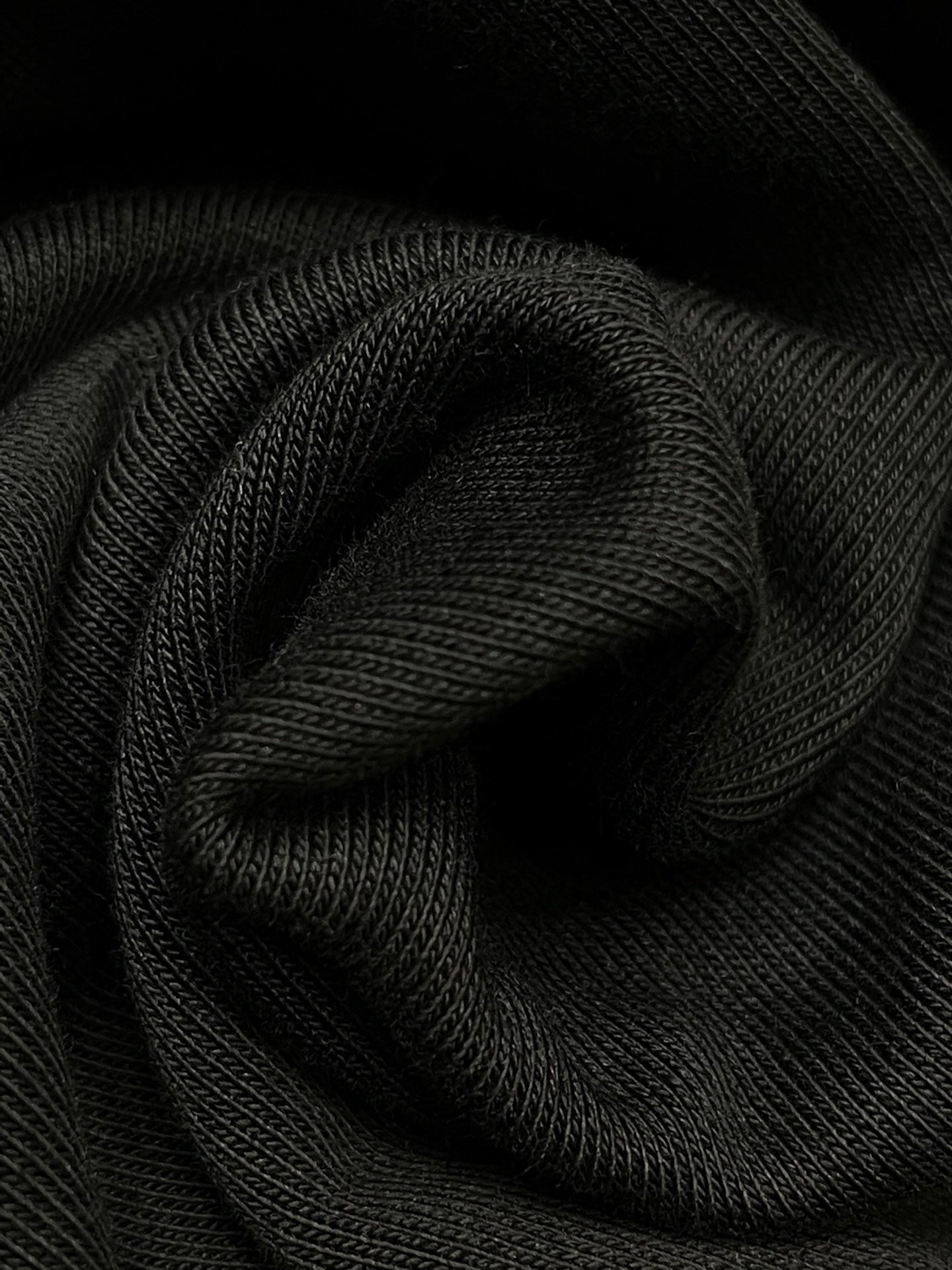 Schwarze und graue Jacke