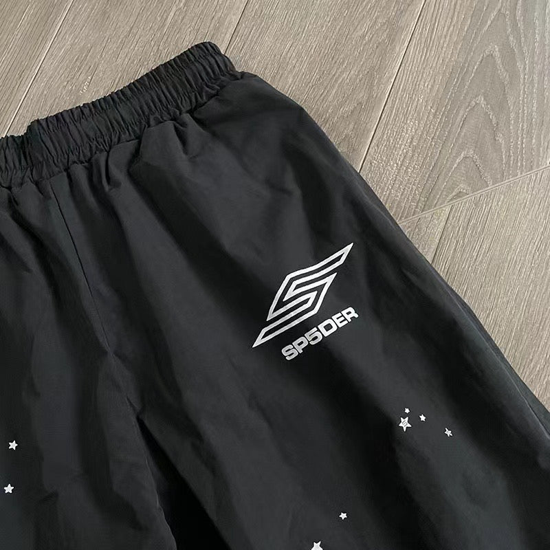 Schwarze und blaue Jacke mit Hose