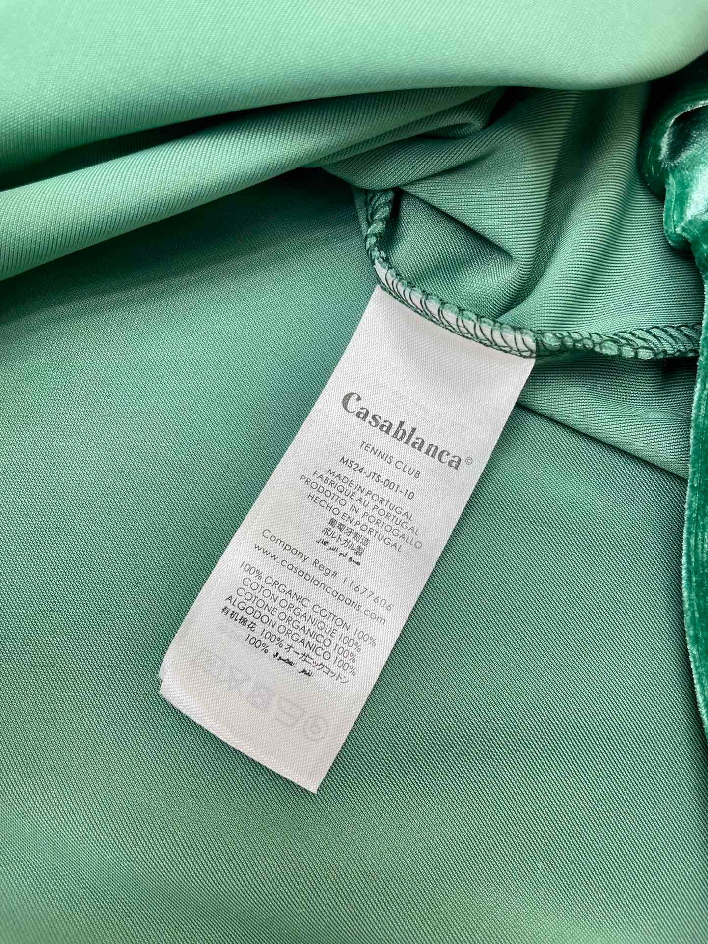 Schwarze und grüne Jacke