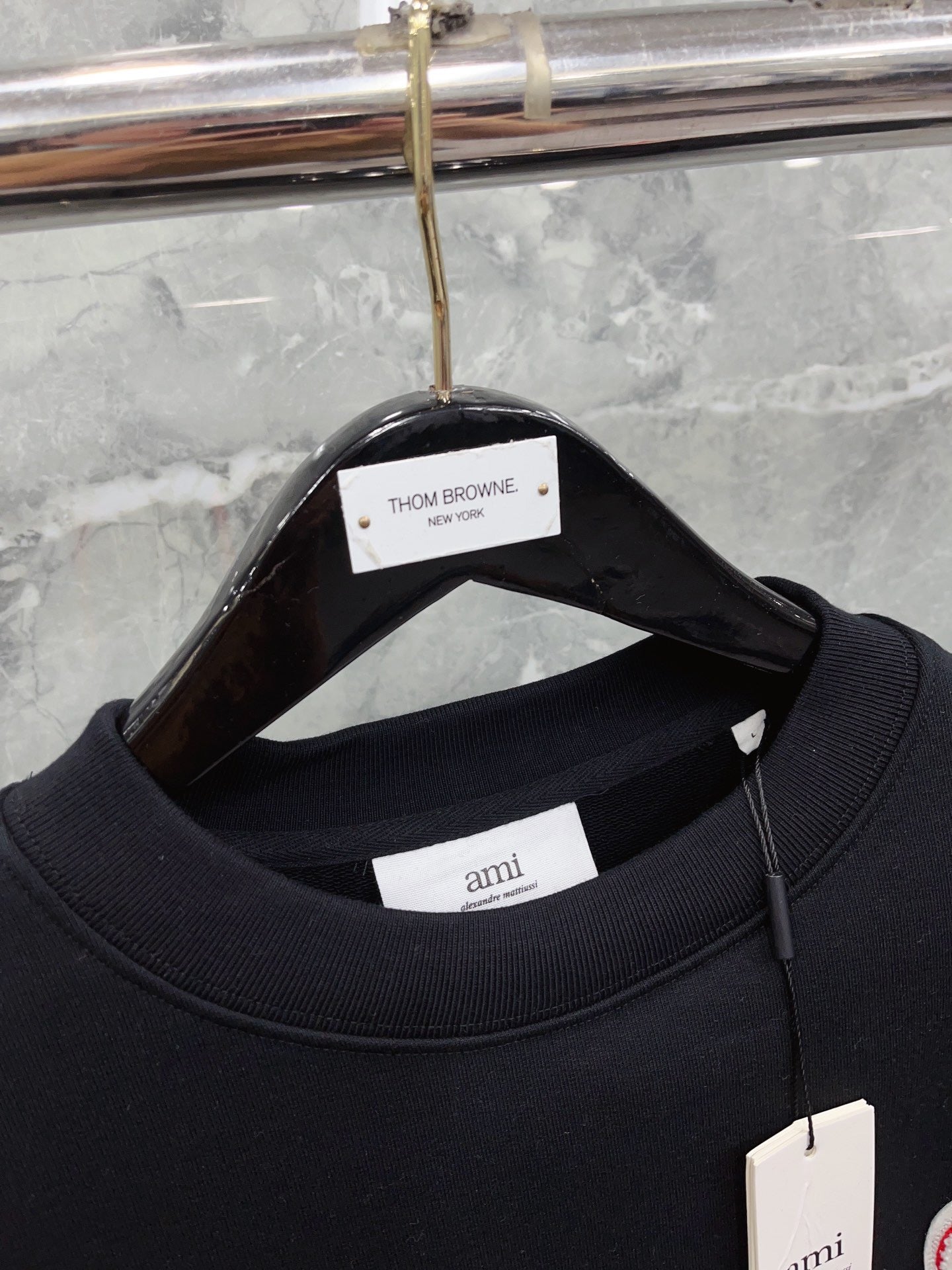 Jersey negro, gris y blanco